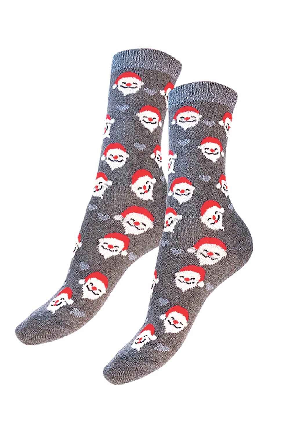 Gray socks with Santa Claus faces pattern on a white background