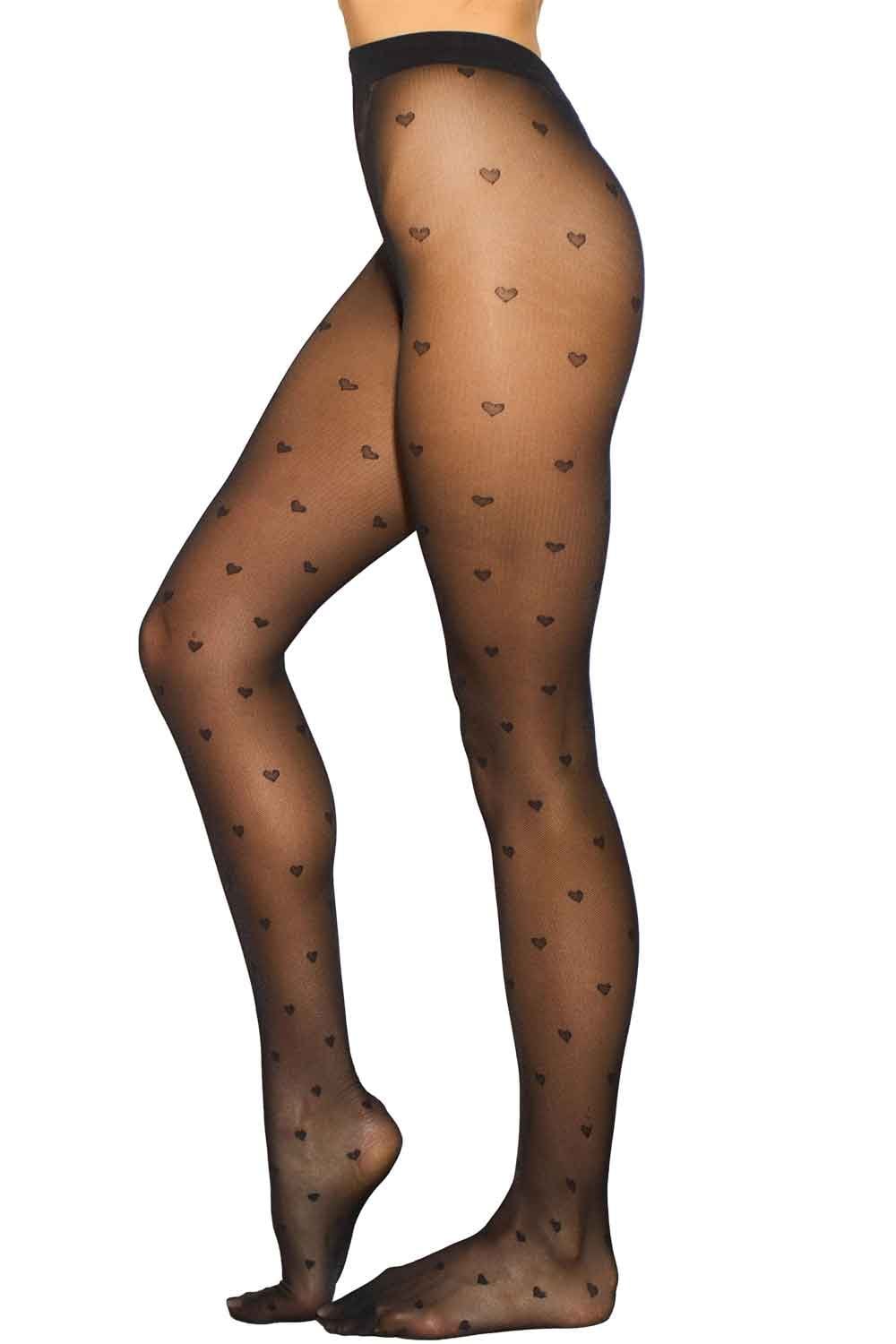 Allana black tights with heart pattern worn by a model on a white background