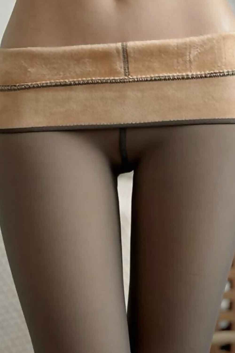 Close-up of fleece lined tights on  a white background