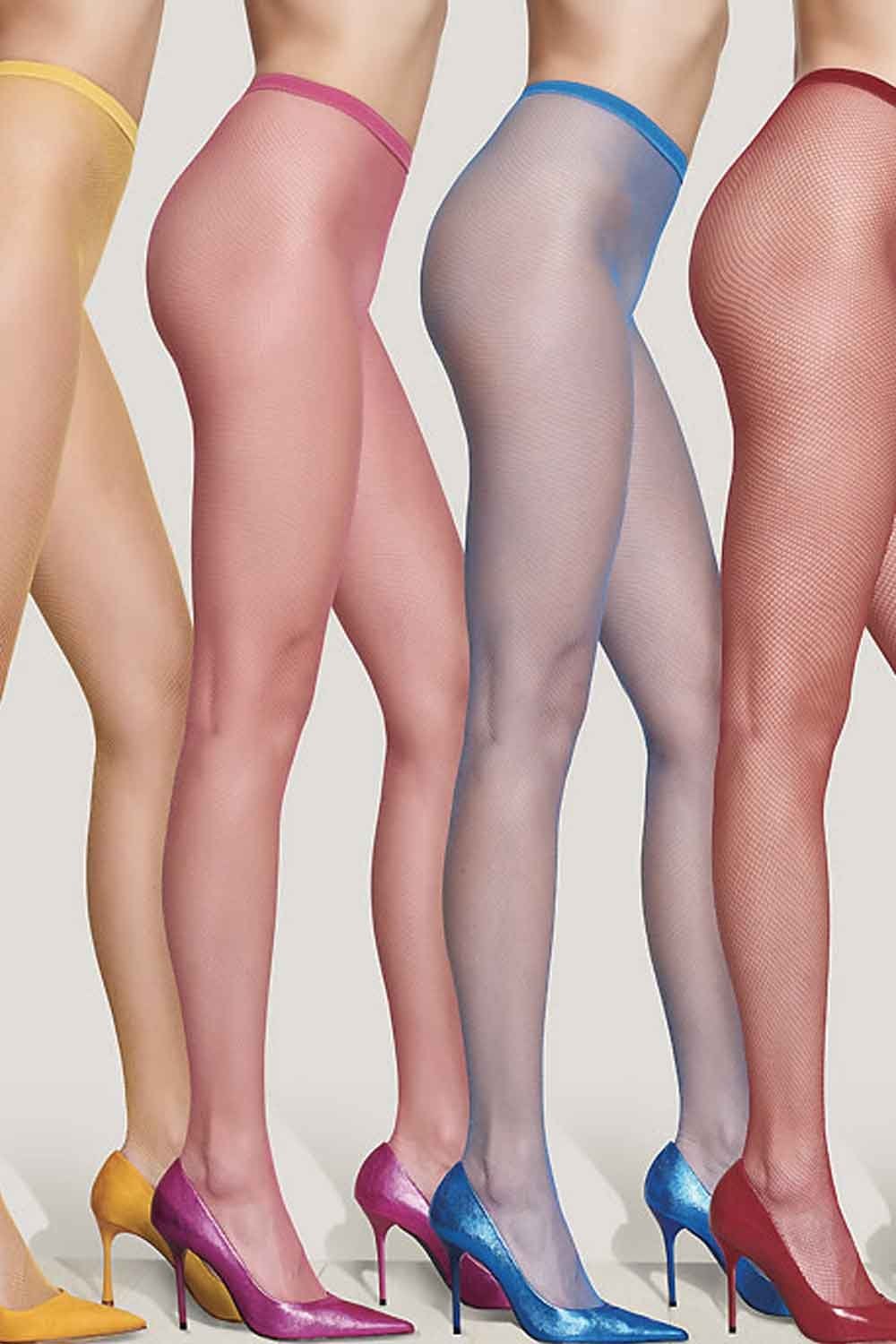 Colorful fishnet tights worn with high heels on a plain background