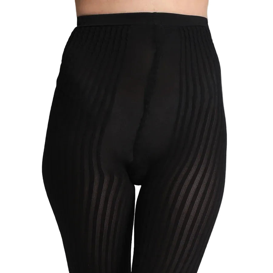 Black high-waisted ribbed design tights with vertical ribbed stripes, shown on a model. 