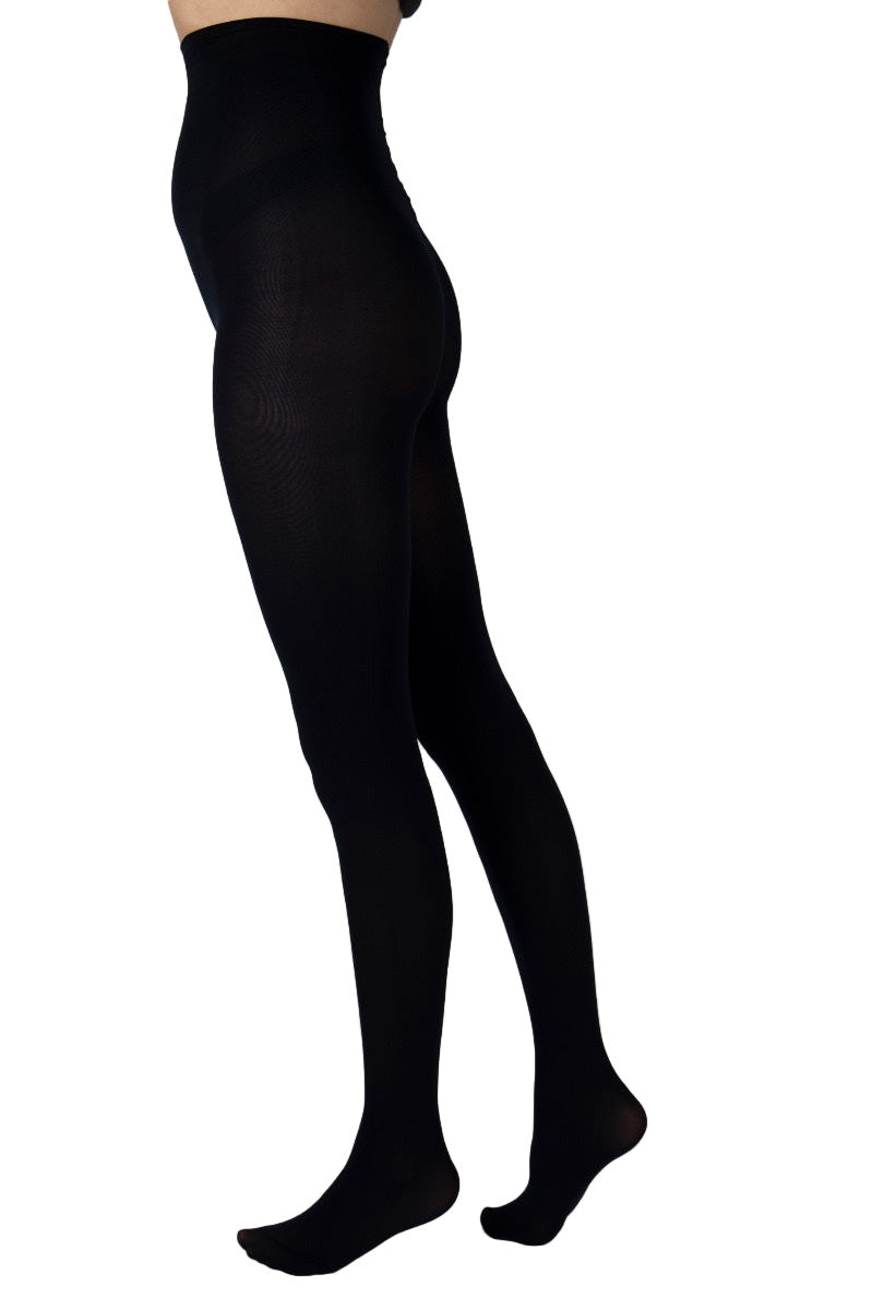 Black tights worn by a person on a white background