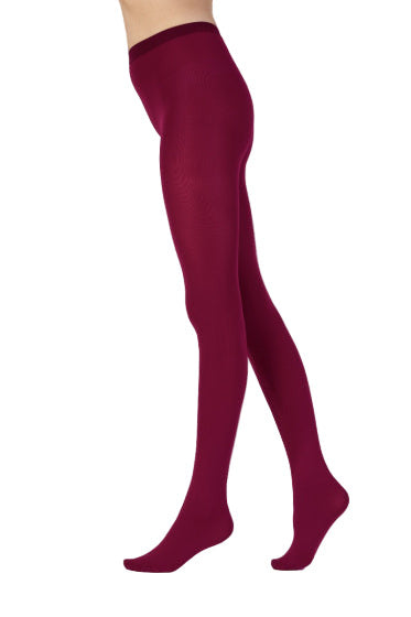 Cherry opaque tights on a white background