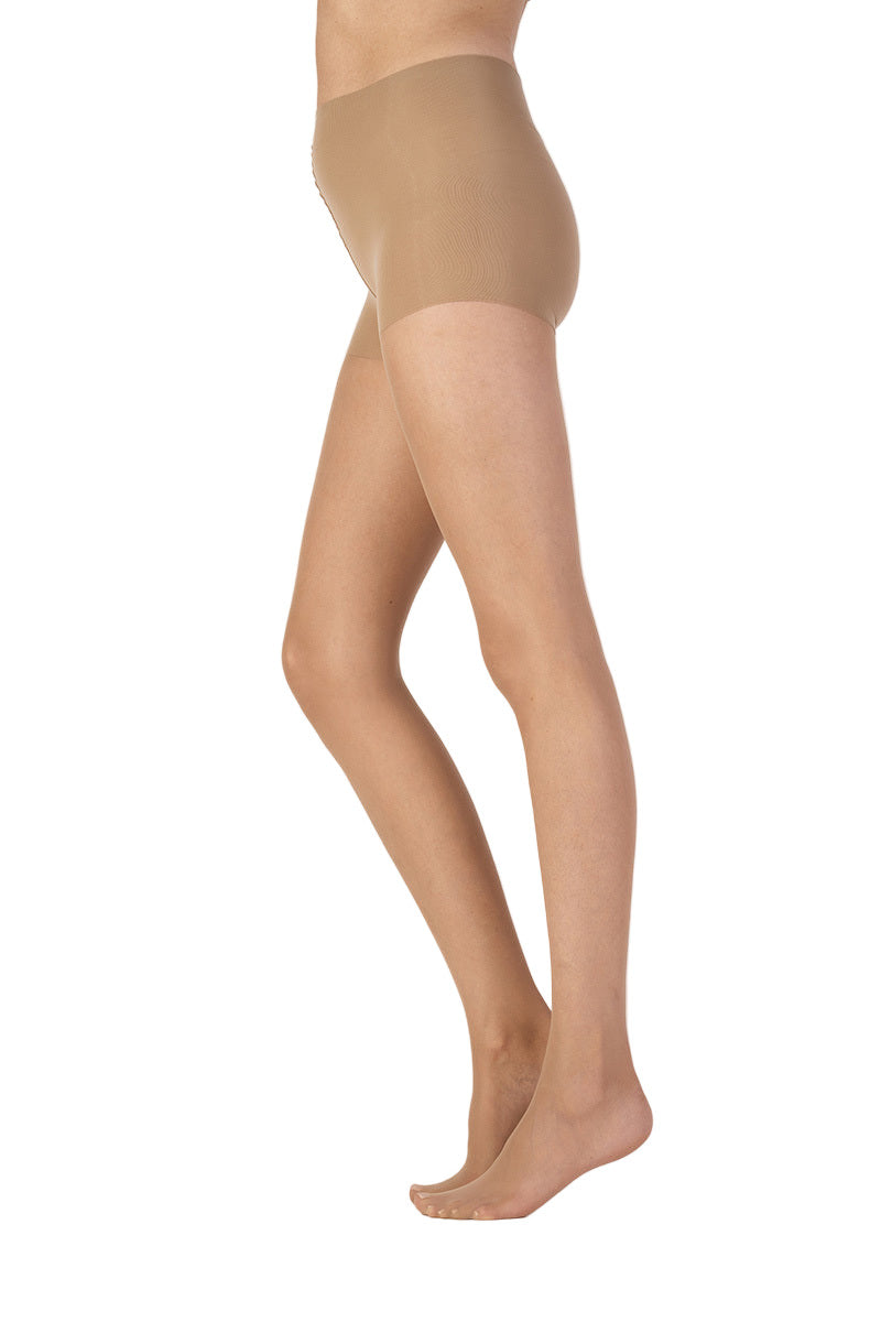 Nude tights worn by a person on a white background