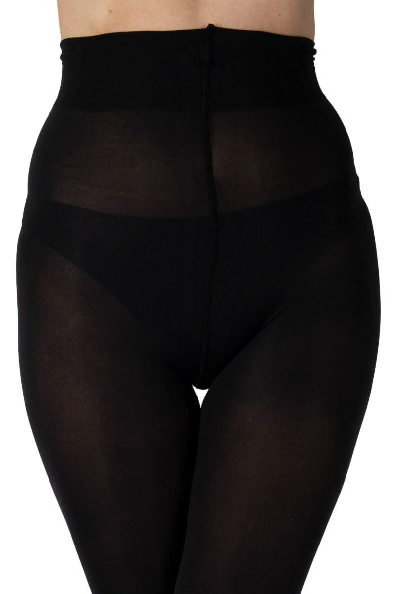 Black 50 denier matt opaque tights worn by a person on a white background