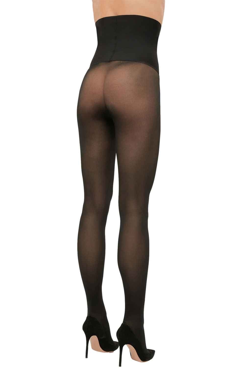 Black high waist tights worn by a model on a white background