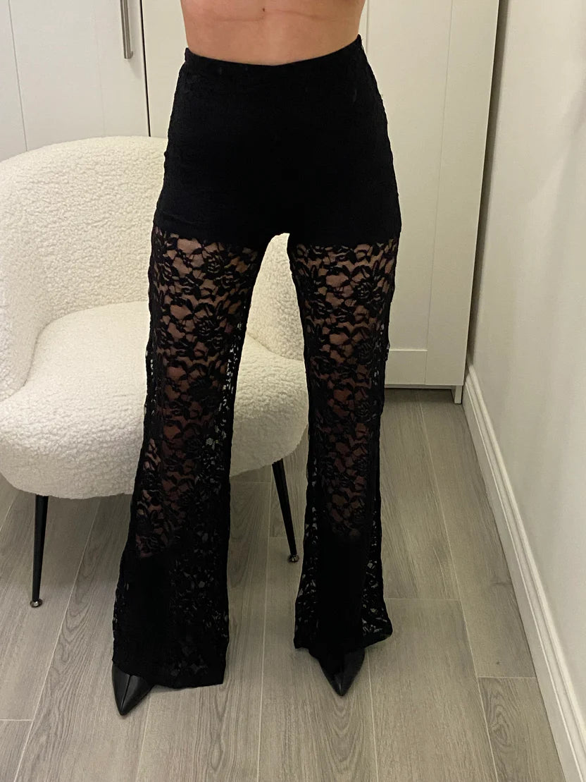 Allana lace trousers in black with a floral design