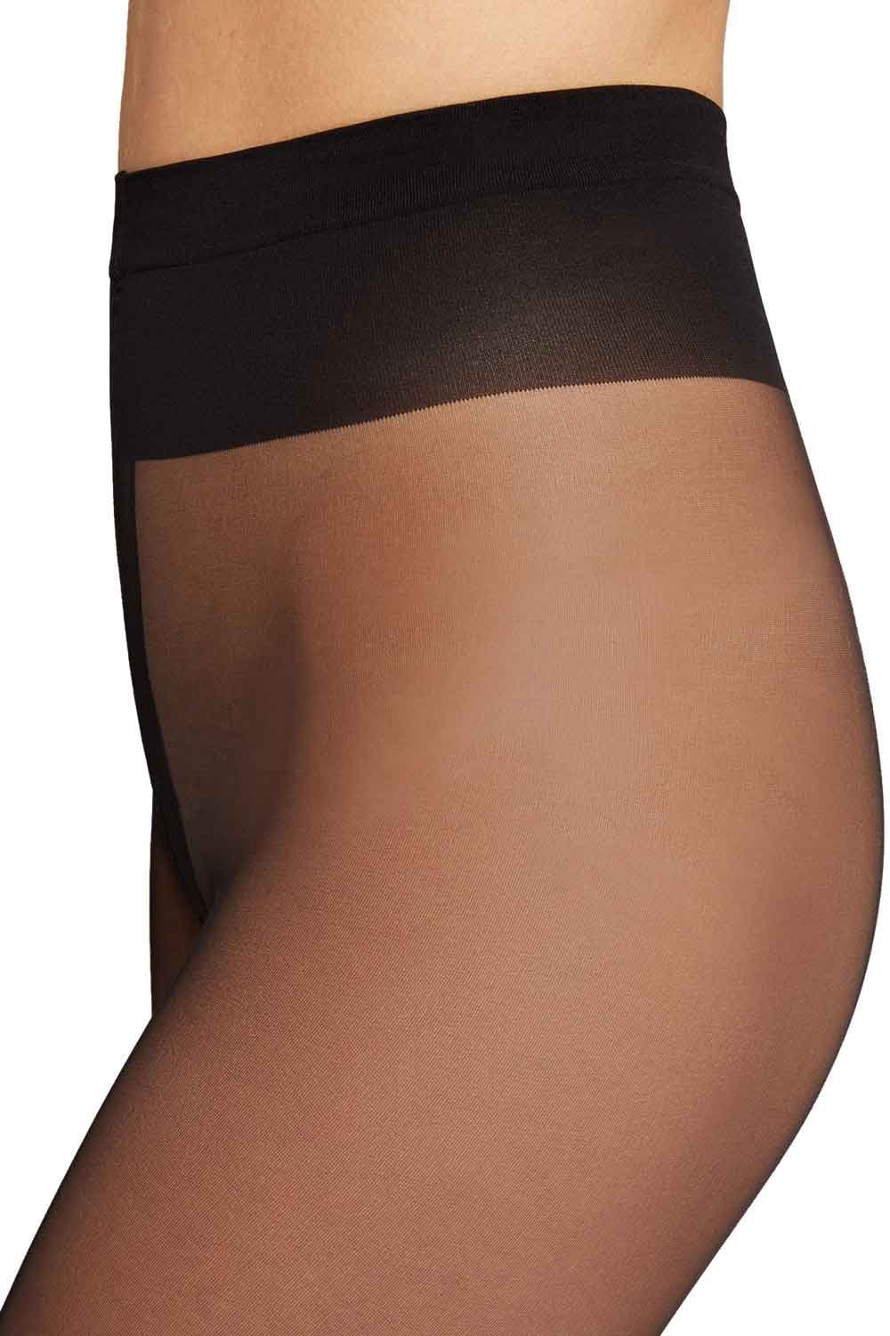Black seamed tights with waistband on a white background
