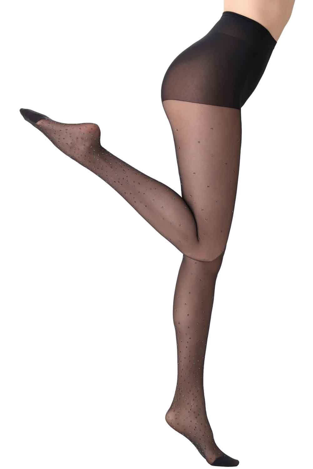 Black tights with a sparkly dot  pattern worn by a person on a white background