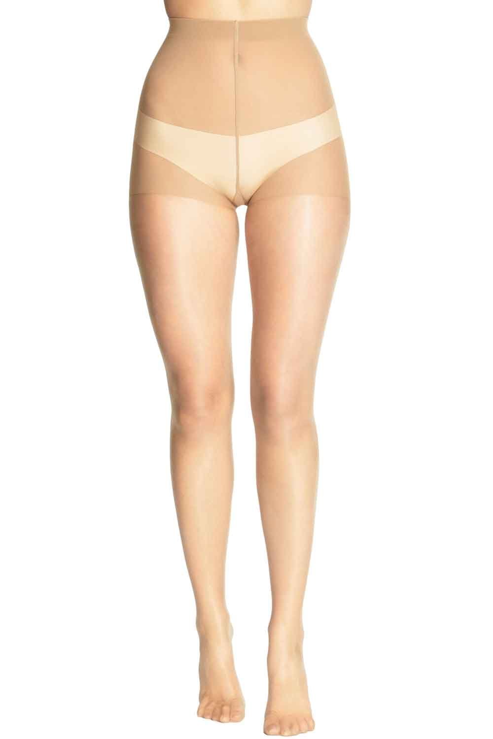 Champagne coloured tights on a white background