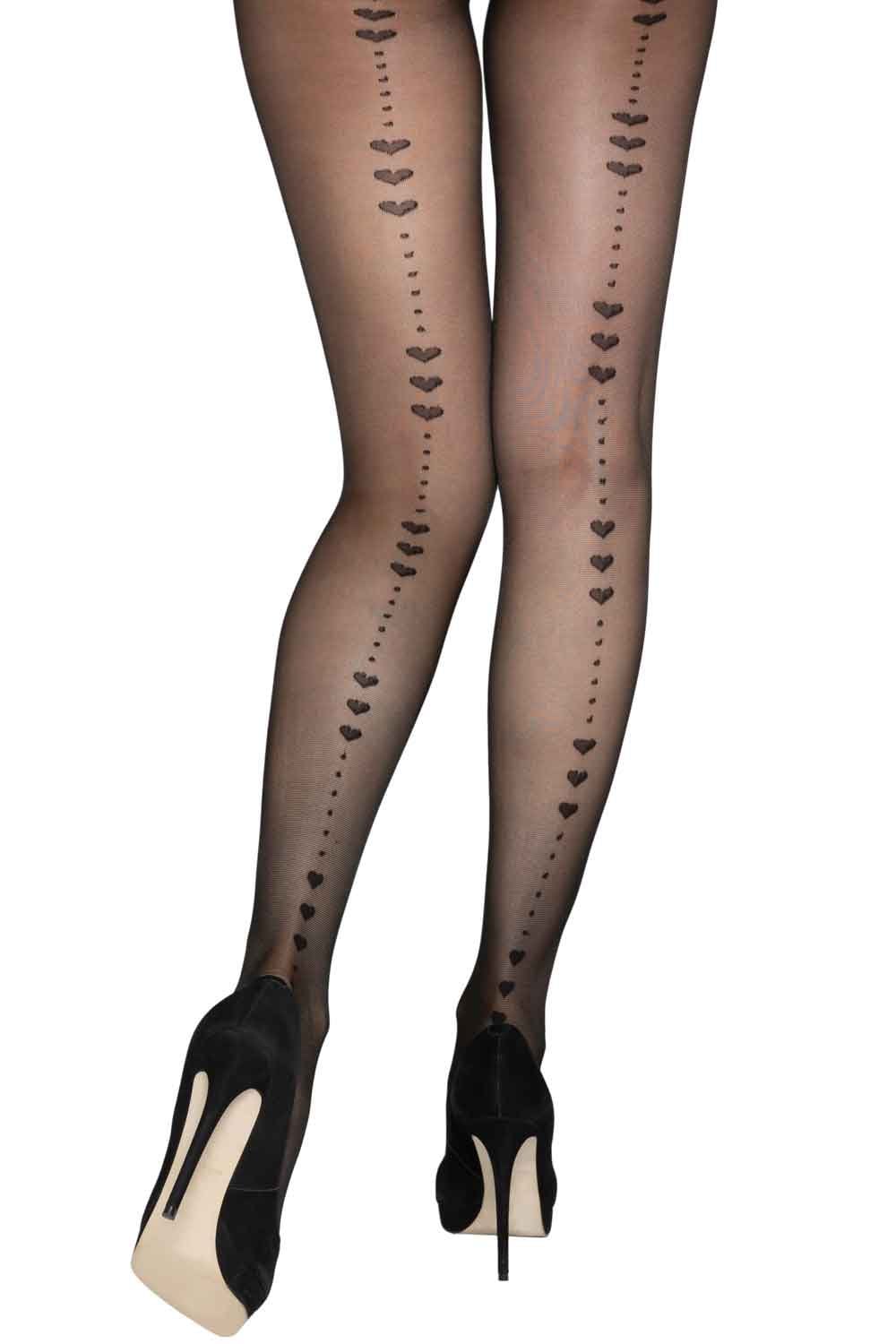 Black tights with heart backseam pattern worn by a person on a white background