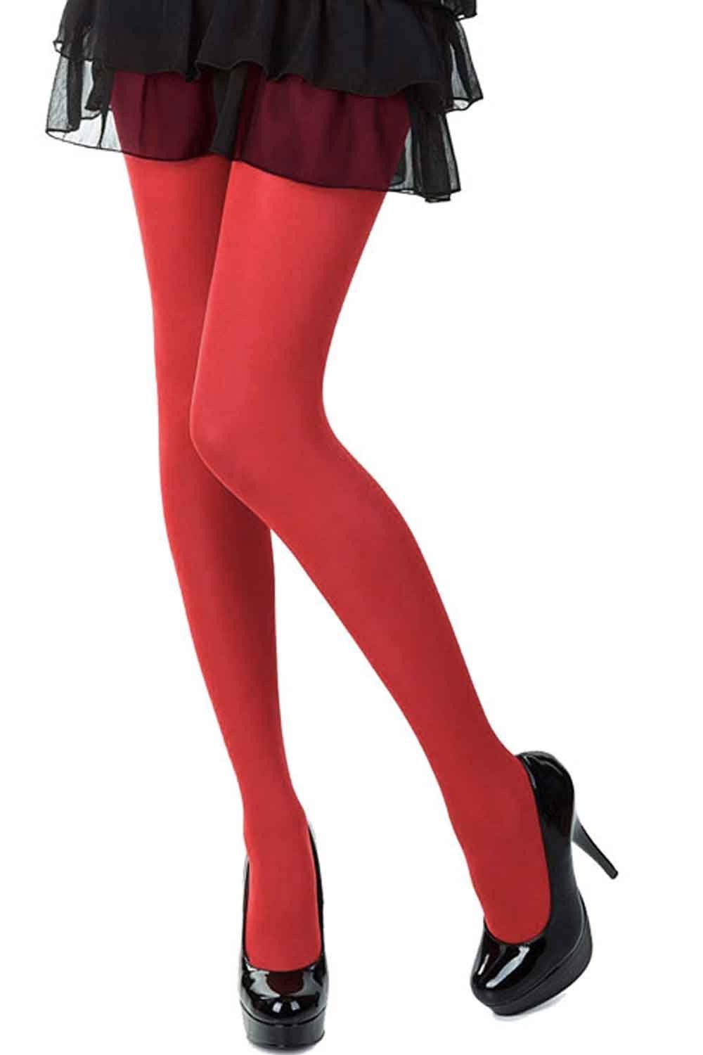 Red tights worn with a black skirt and shoes on a white background