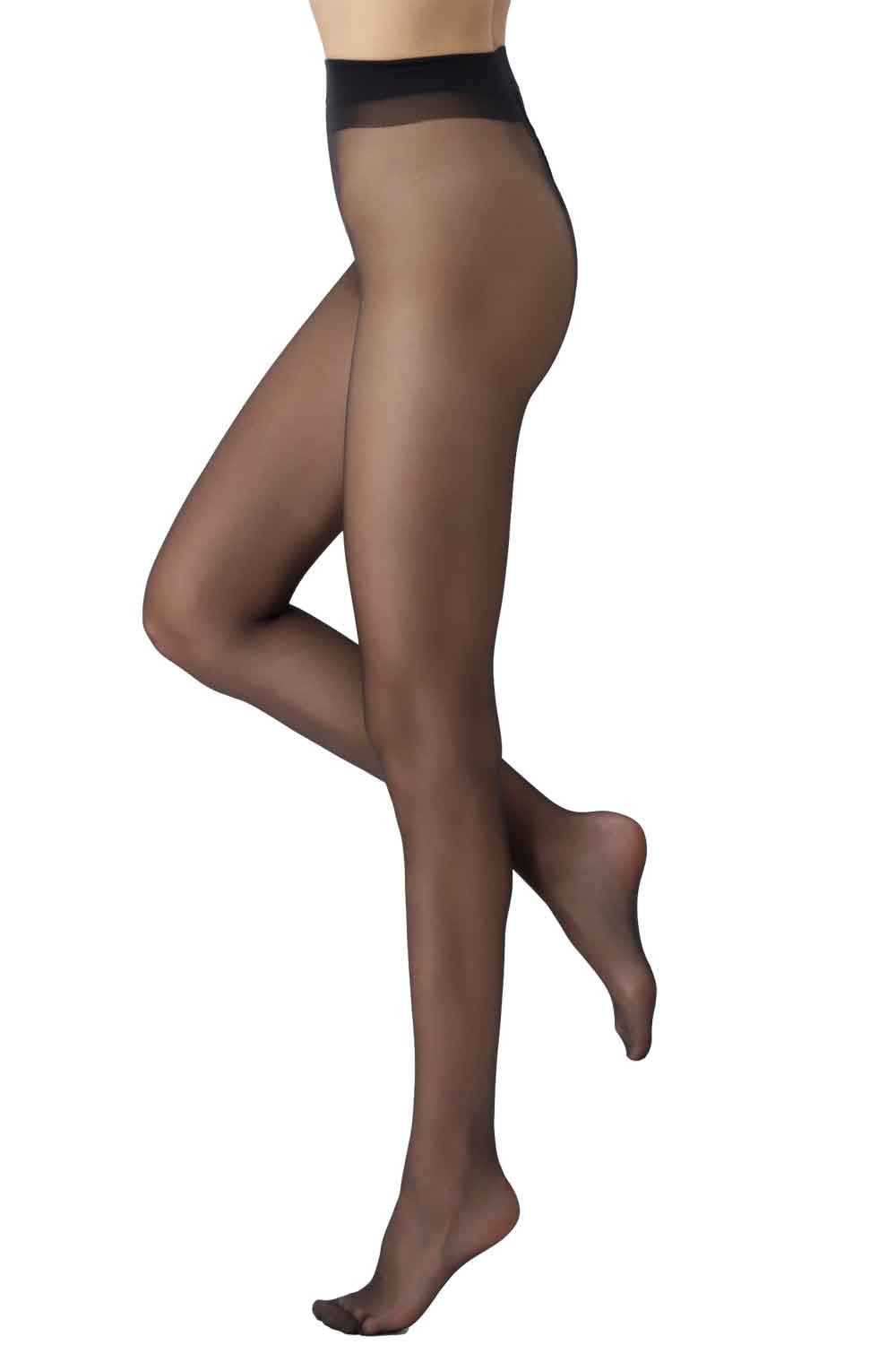 Sheer black tights worn by a model on a white background