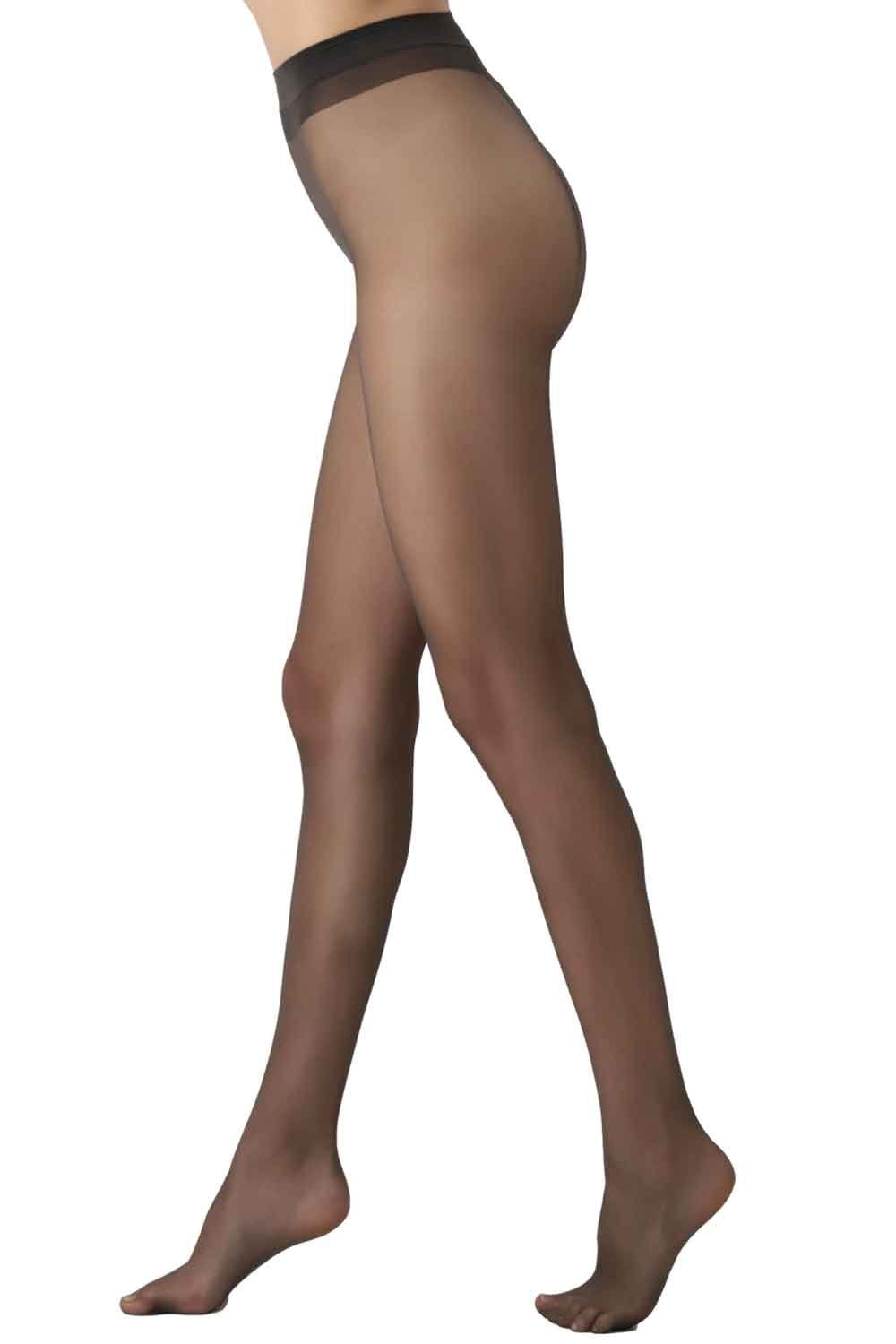 Black tights worn by a person on a white background