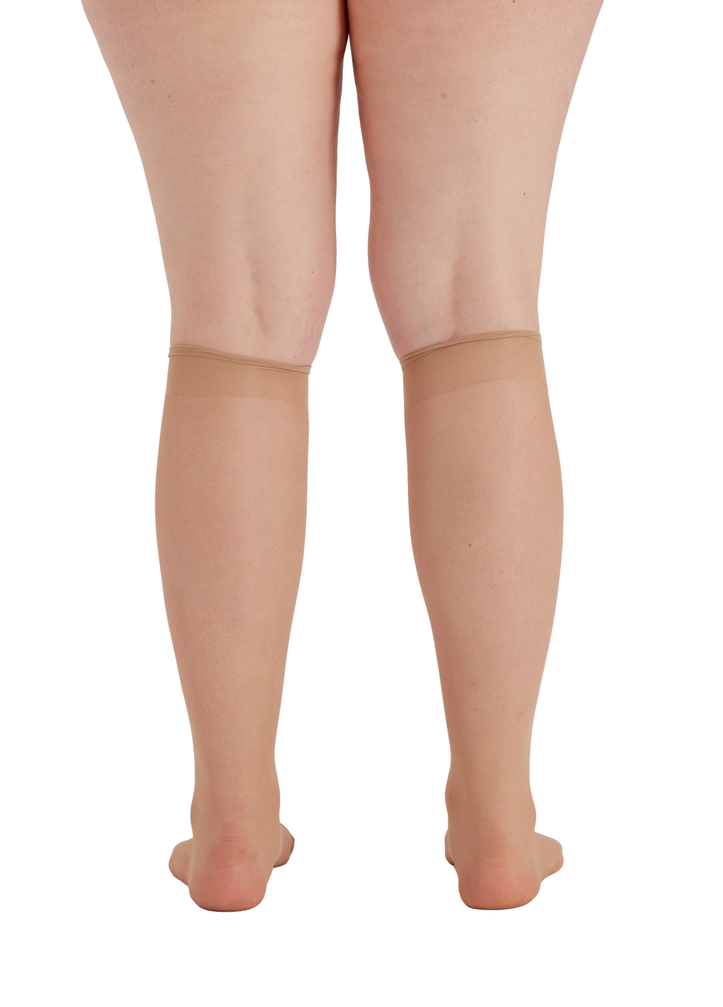 Nude knee highs worn by a person on a square patterned  background