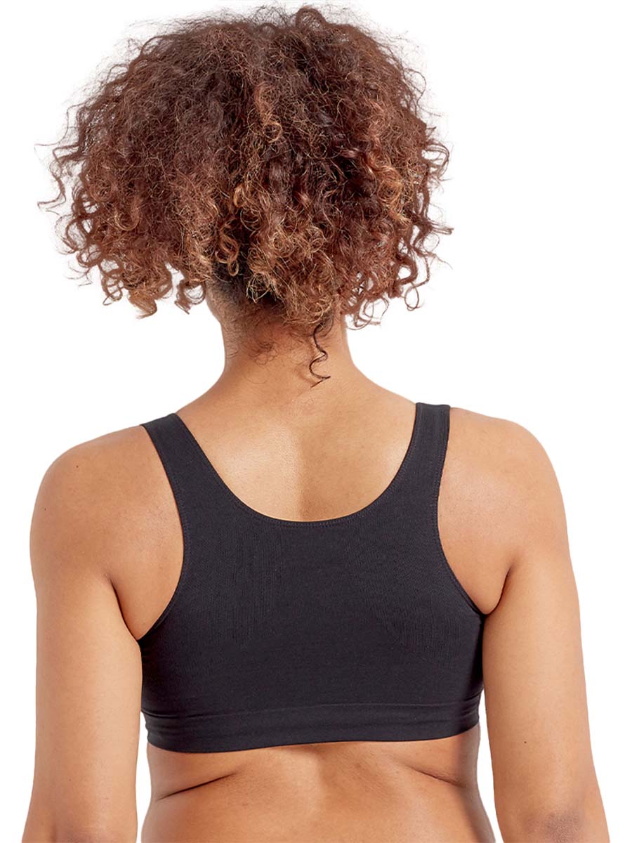 Model wearing a black comfort bra on a white background