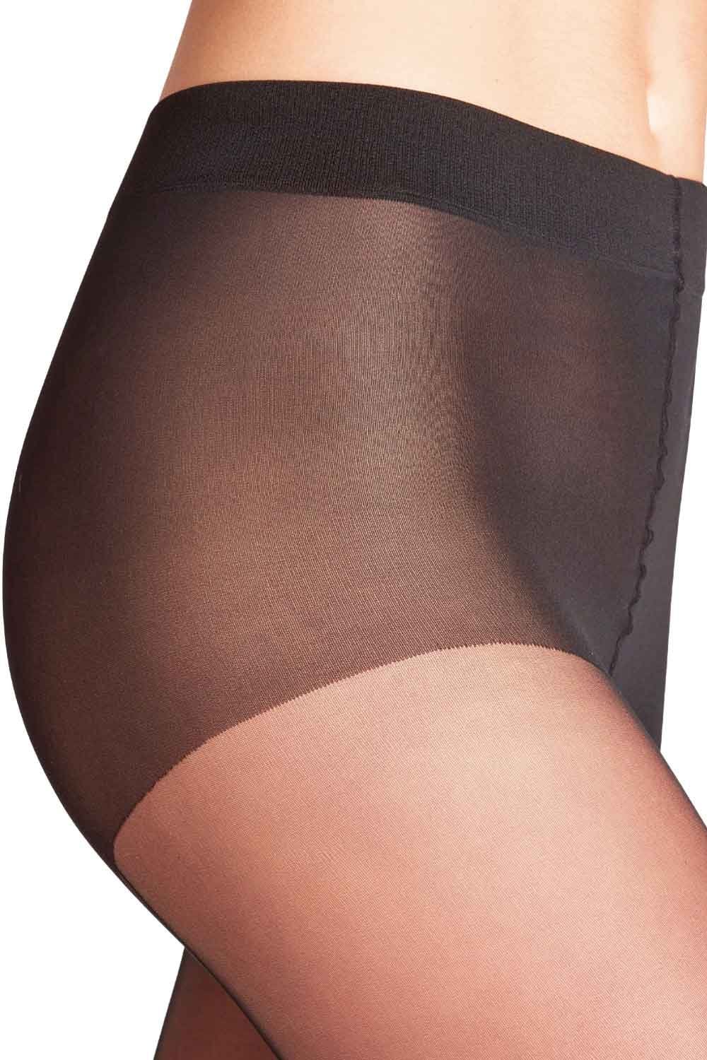 Black corset tights on a white background