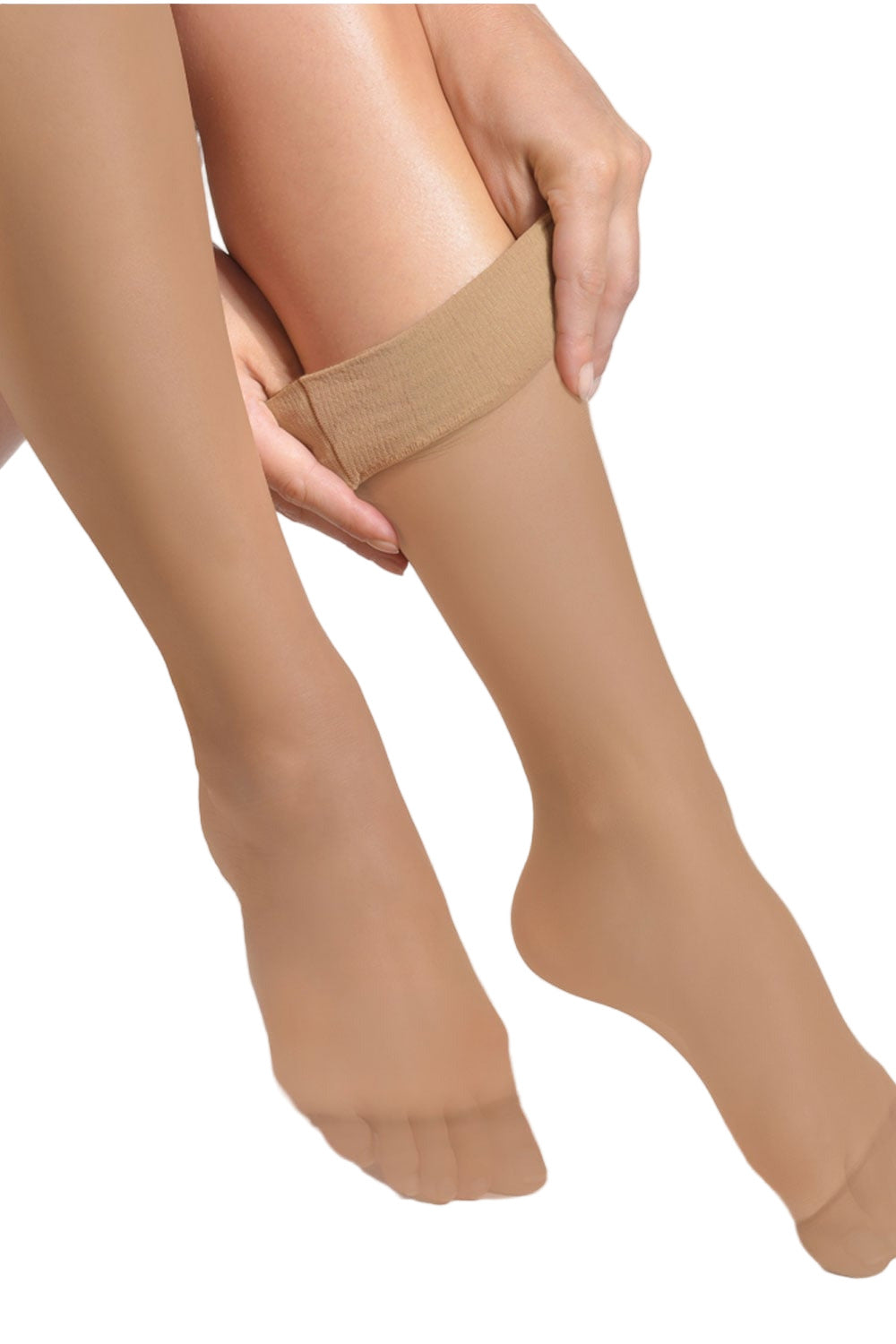 Natural comfort top knee highs being worn on a white background