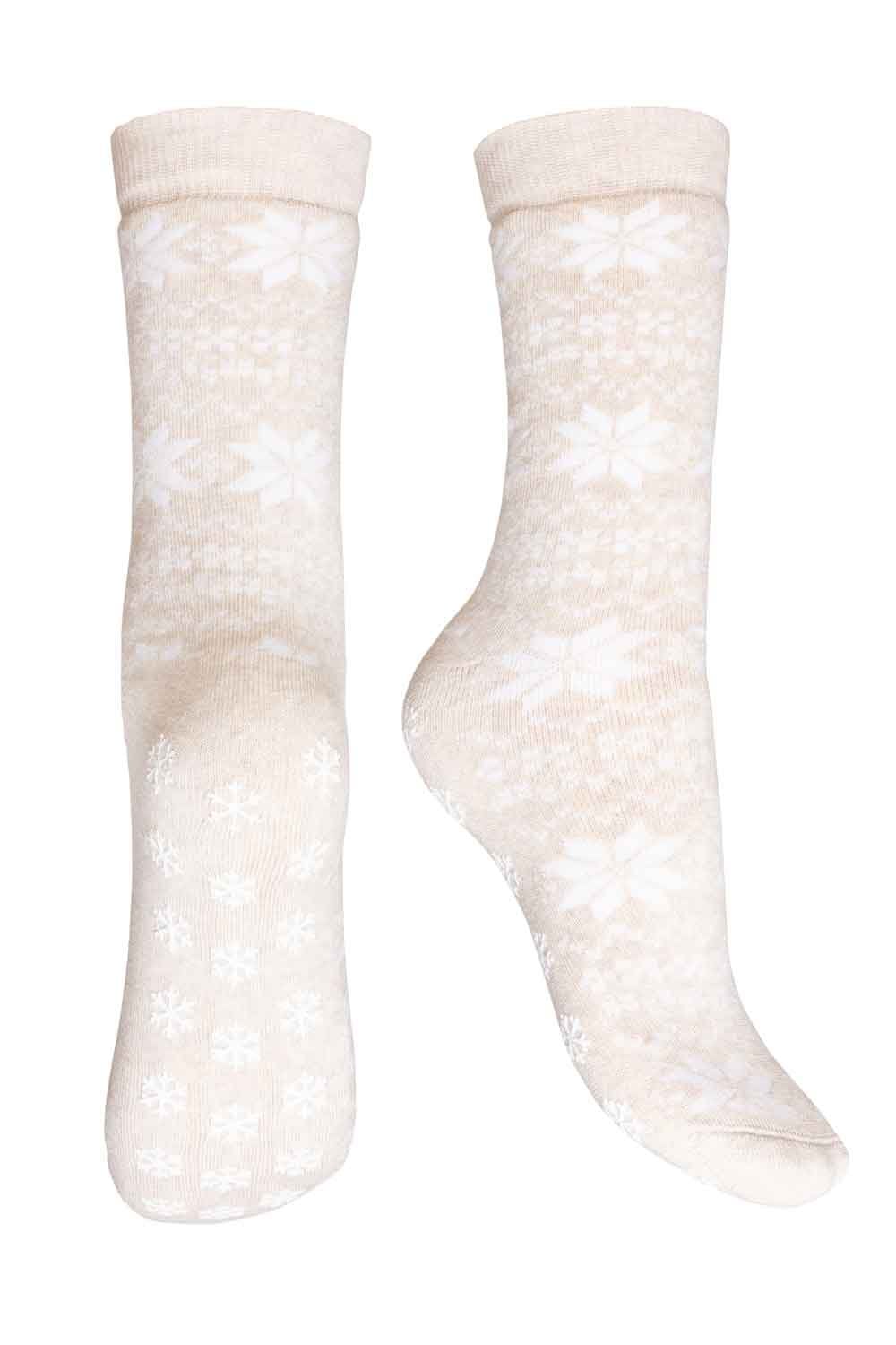 Pair of beige-colored socks with a subtle pattern on a white background