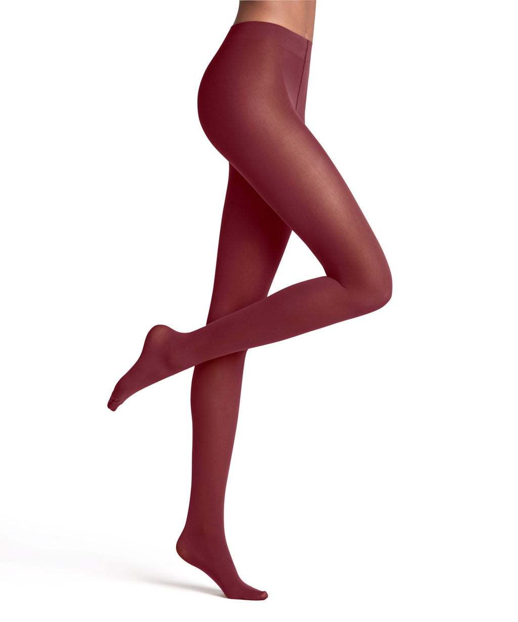 Ruby tights worn by a person on a white background