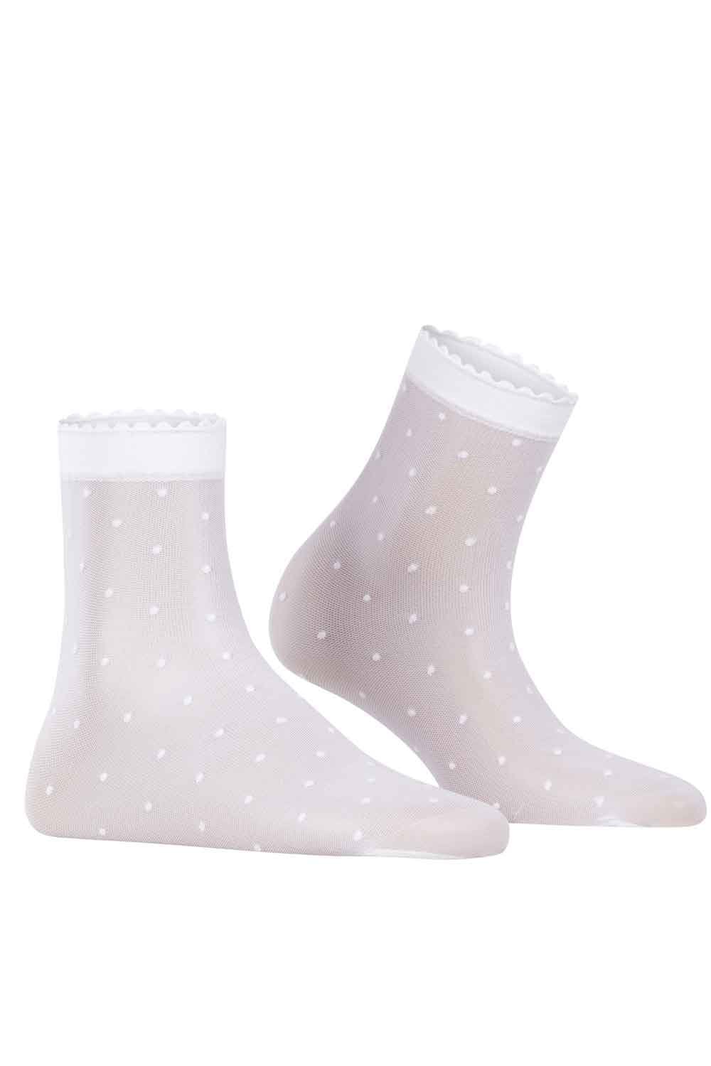 White socks with subtle polka dot pattern on a white background