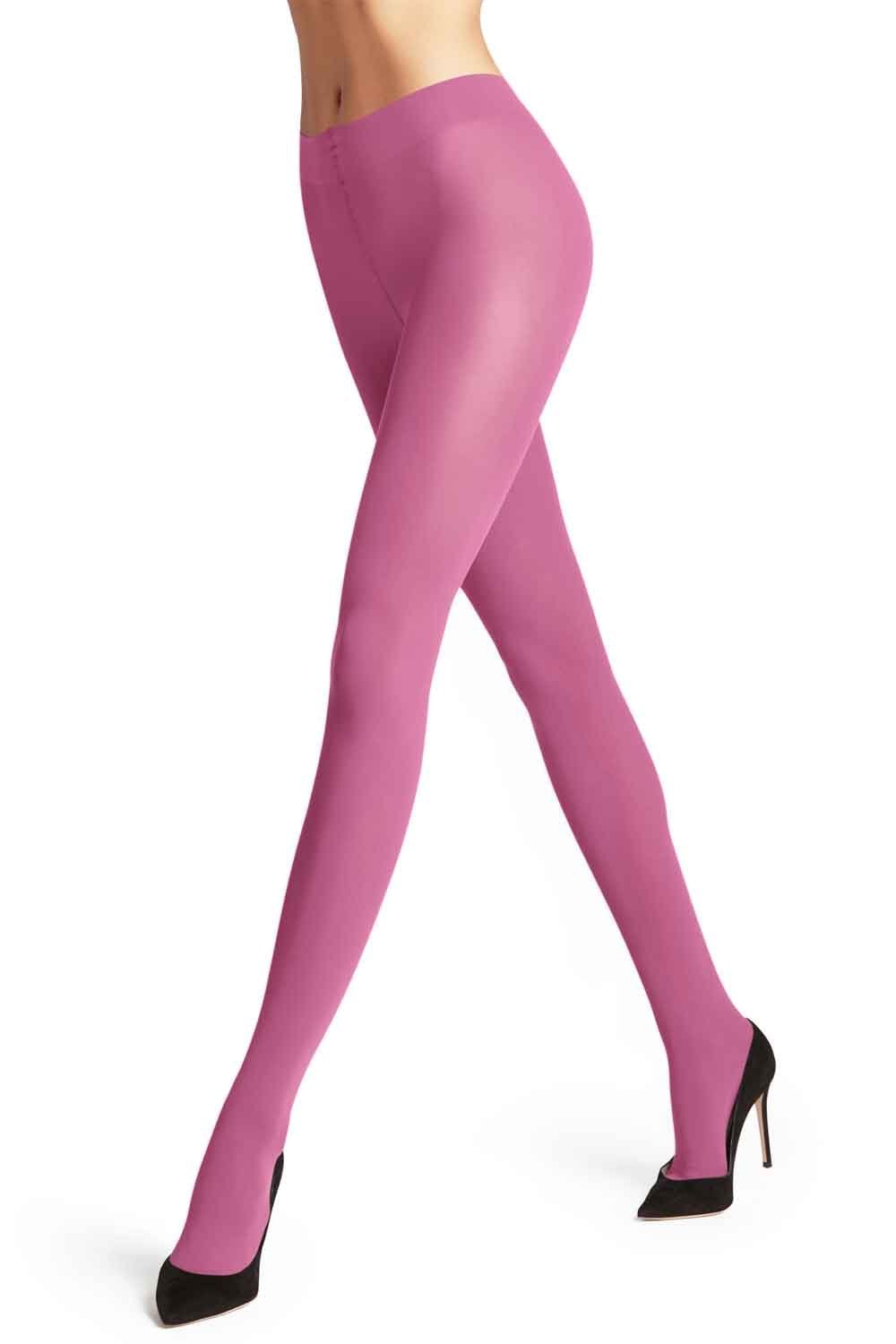 Pink falke tights worn by a model on a white background