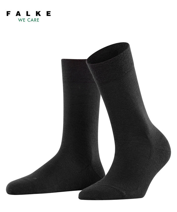 Black socks with Falke branding on a white background