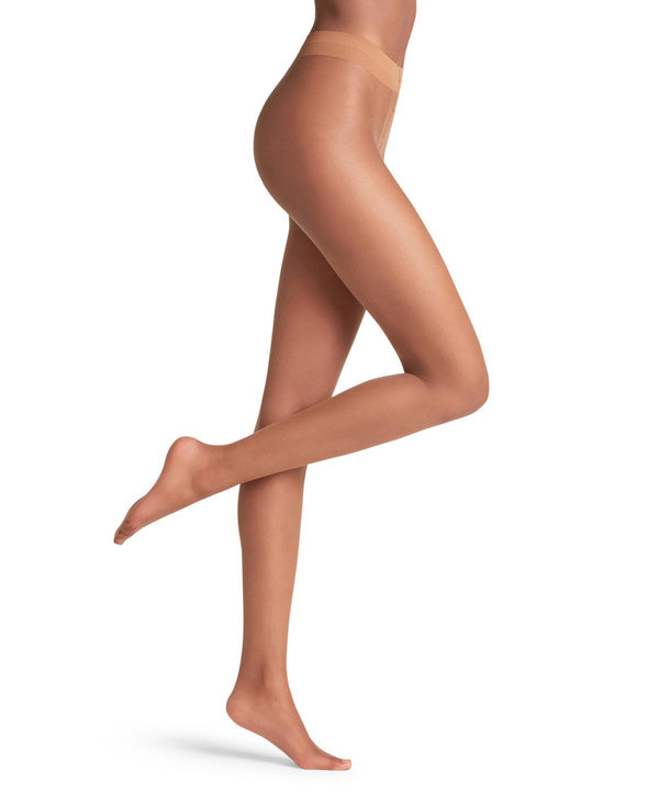 Falke noisette tights being worn on a white background