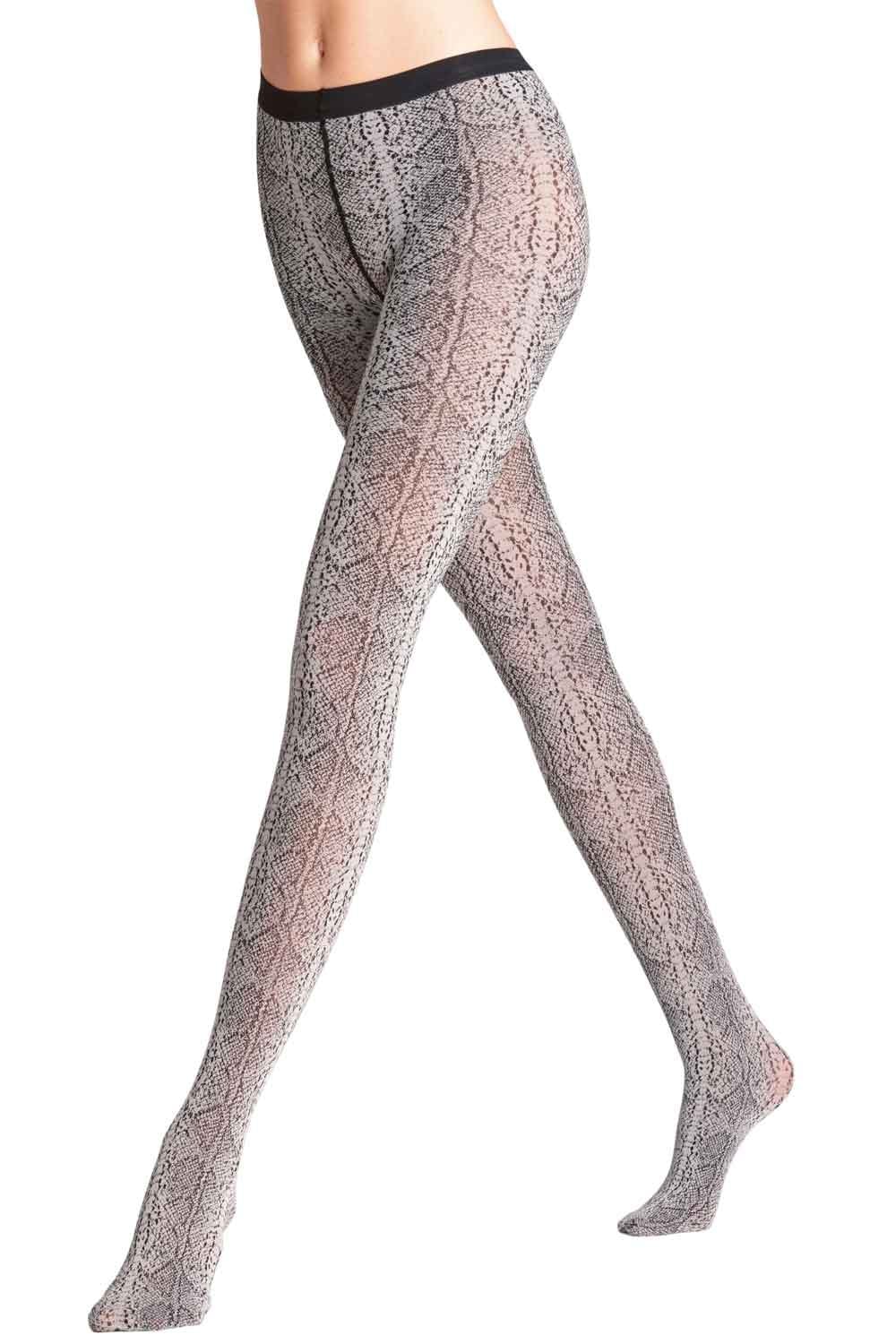 Falke snake skin  tights worn by a person on a white background