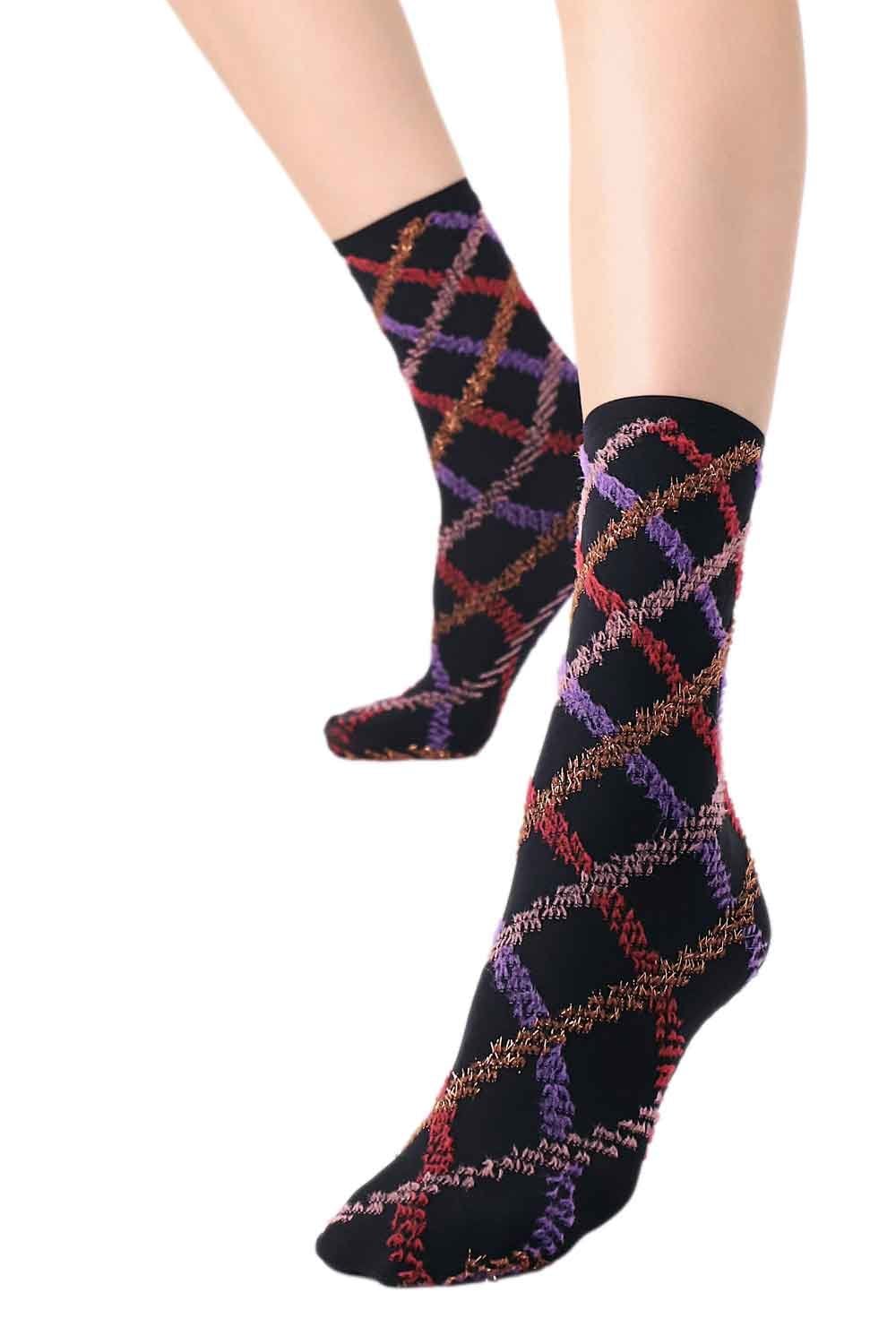 Colorful tartan patterned socks on a white background