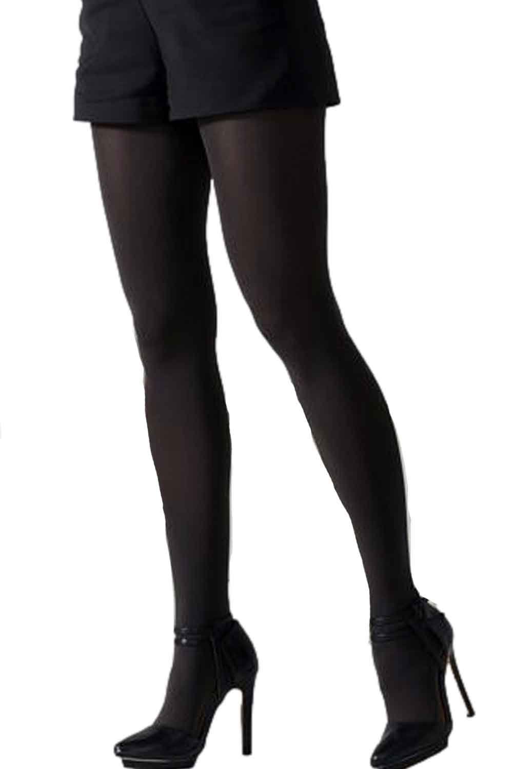 Black tights worn by a person on a white background