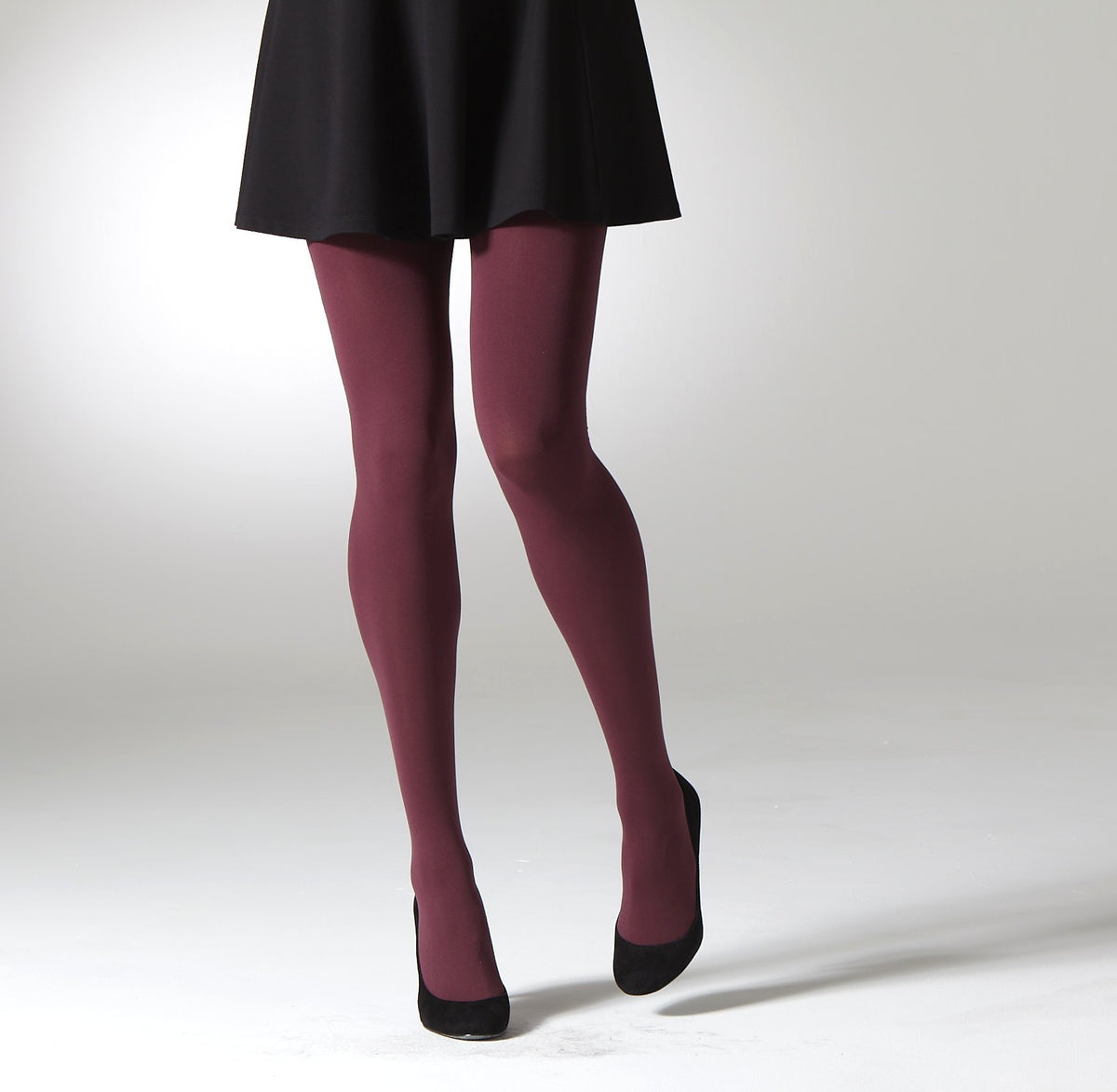 model wearing chestnut burgundy tights