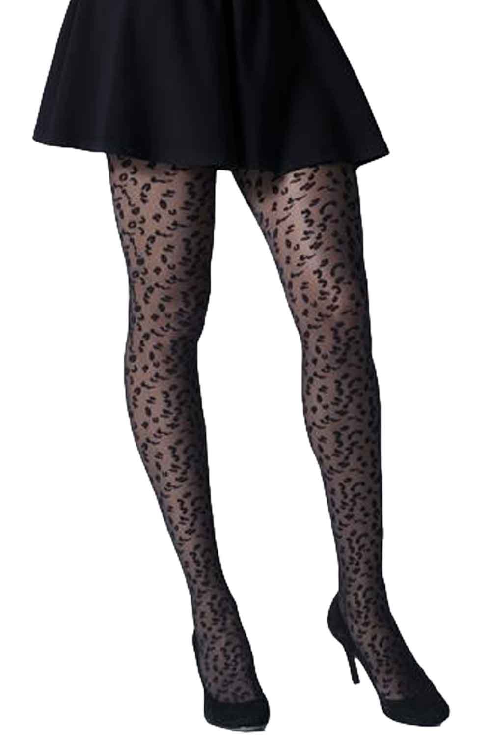 Model wearing leopard print tights on a white background