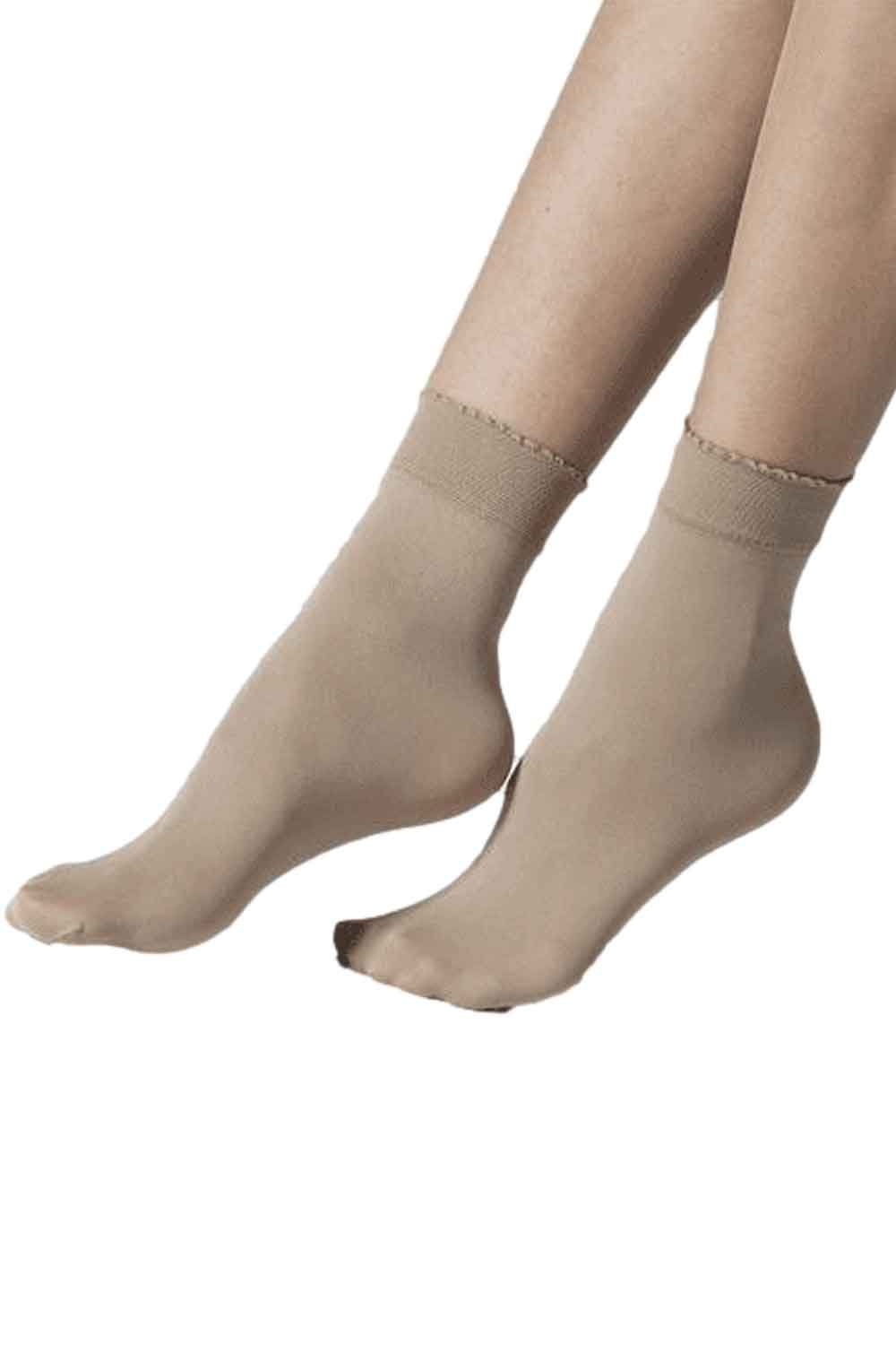 Camel socks worn on   a white background
