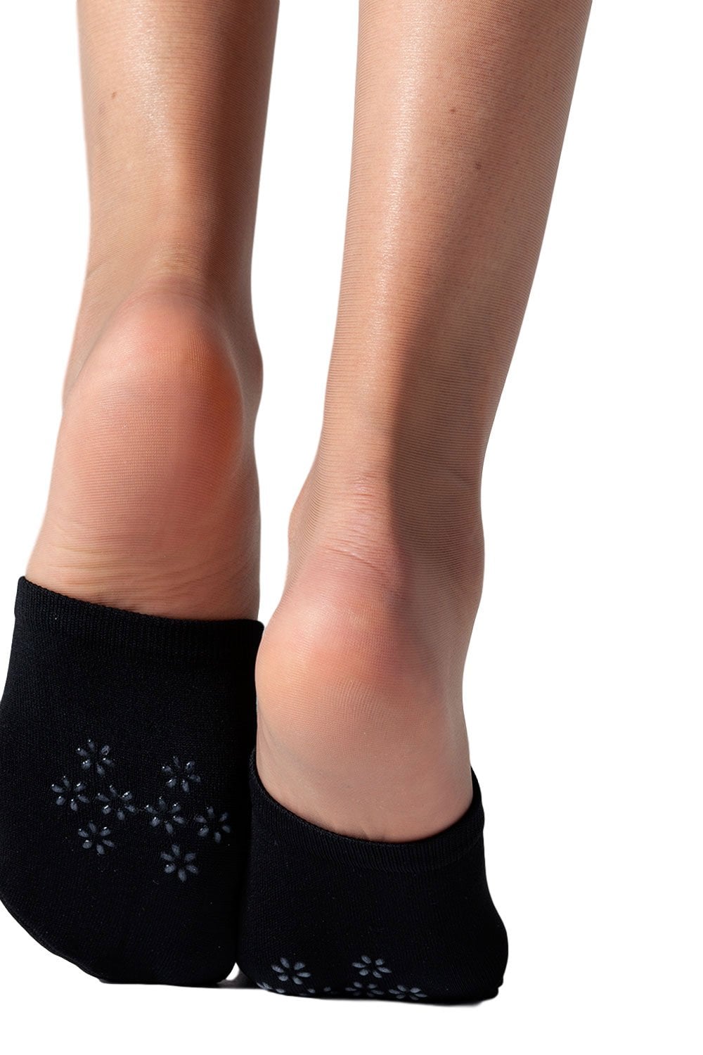 Black mule socks worn by a model on a white background
