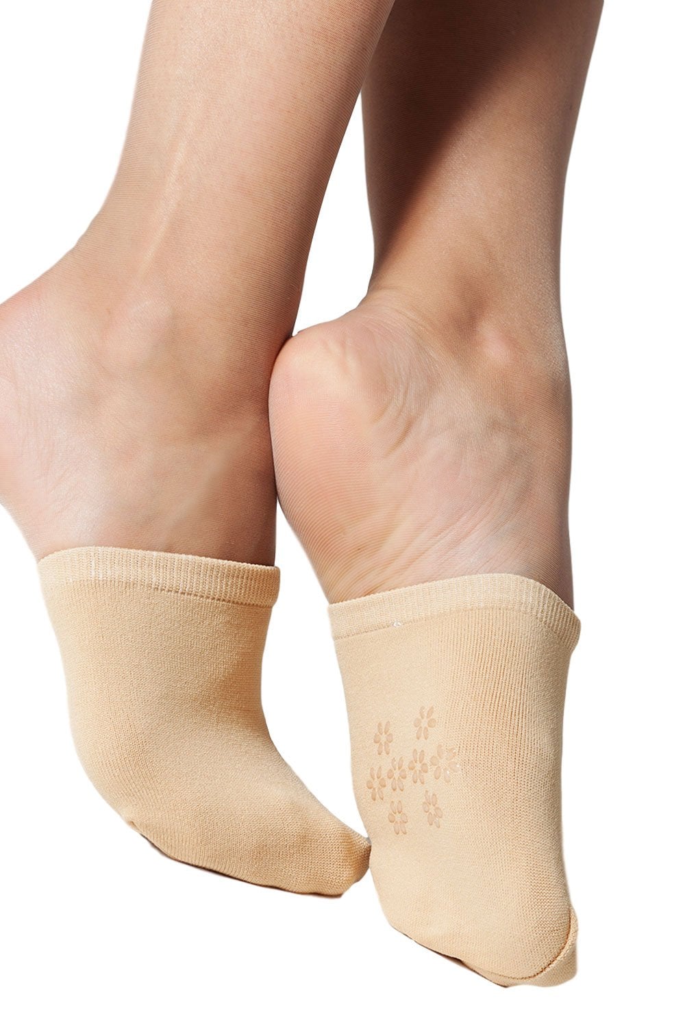 Natursl mule  socks worn on feet against a white background