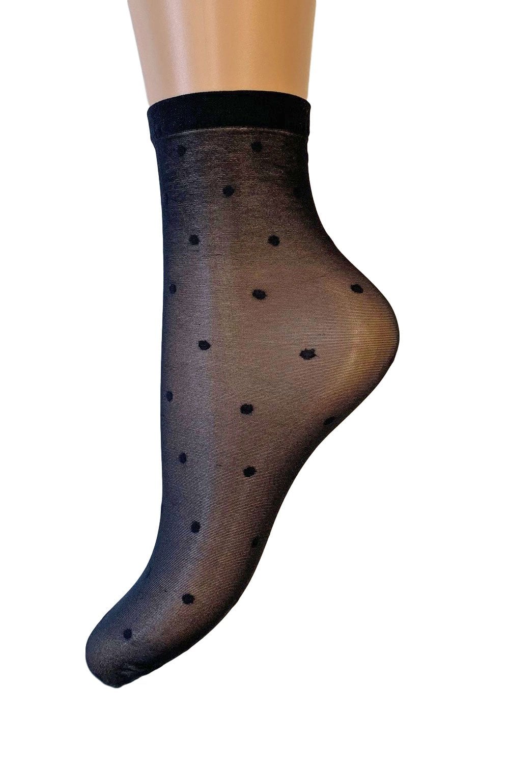 Black polka dot sock on a mannequin foot against a white background