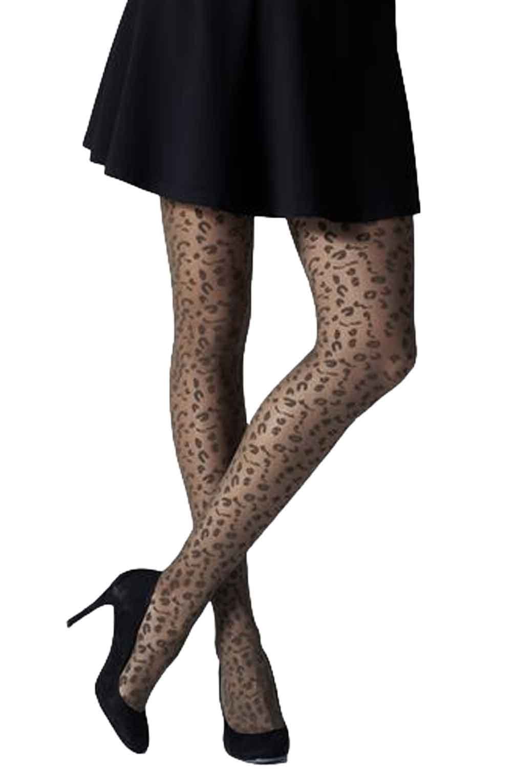 Leopard print tights worn with a black skirt and high heels on a white background