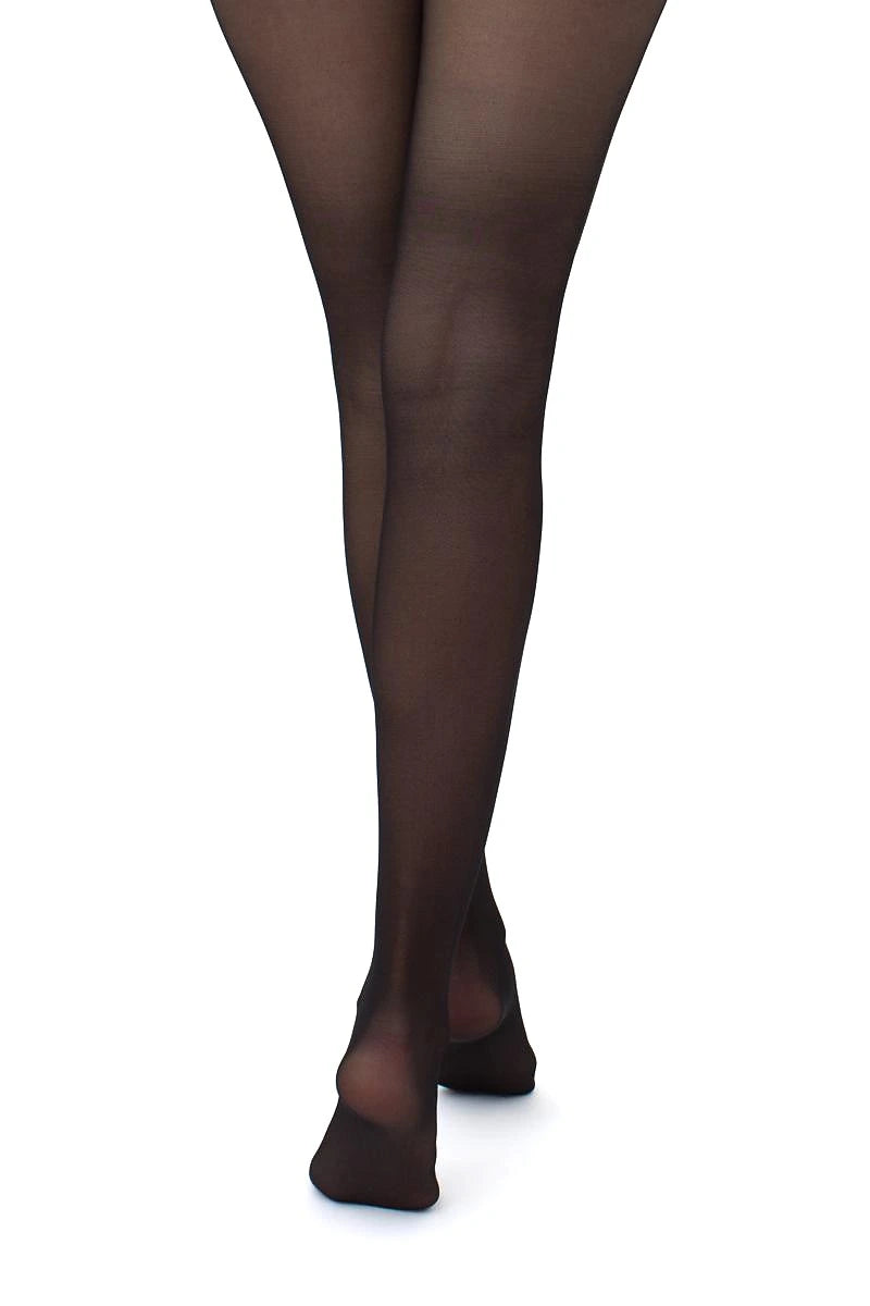 A close-up of a person's legs wearing sheer black tights against a plain white background.
