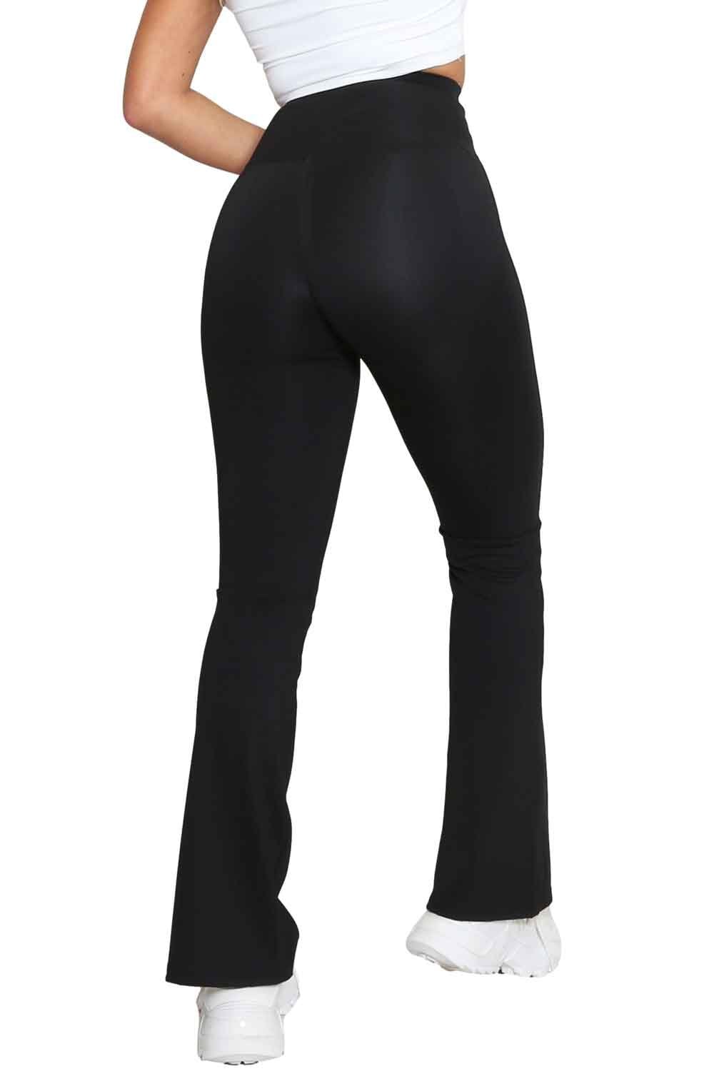 Black leggings worn by a model on a white background