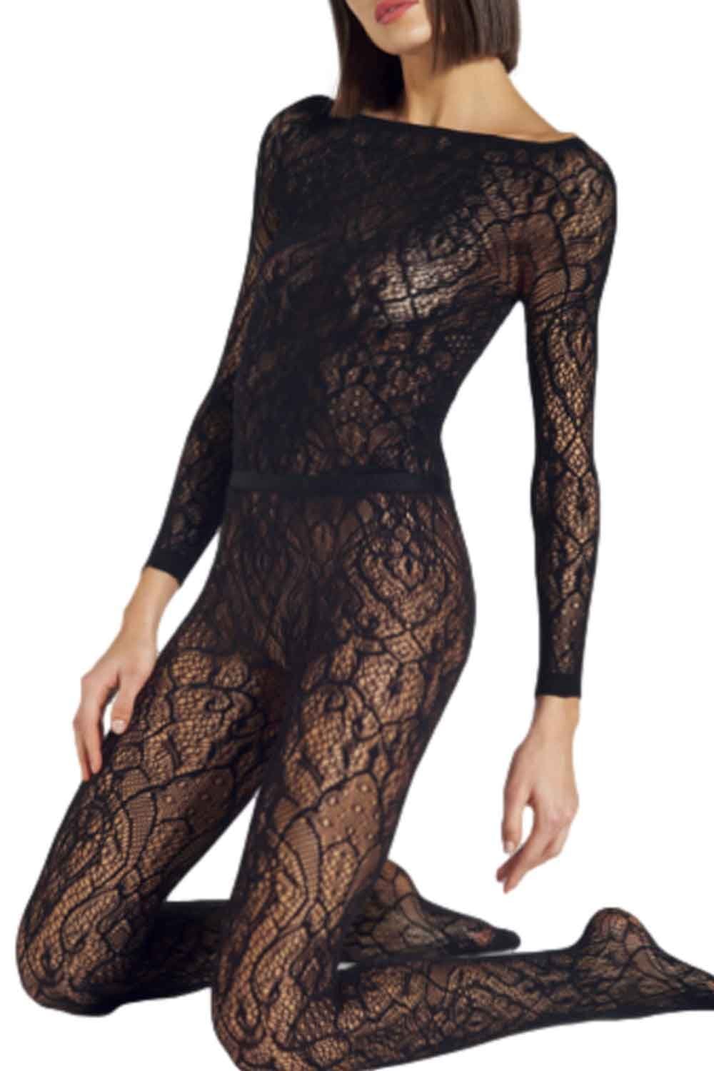 Black lace t shirt with matching tights worn by a model on a white background