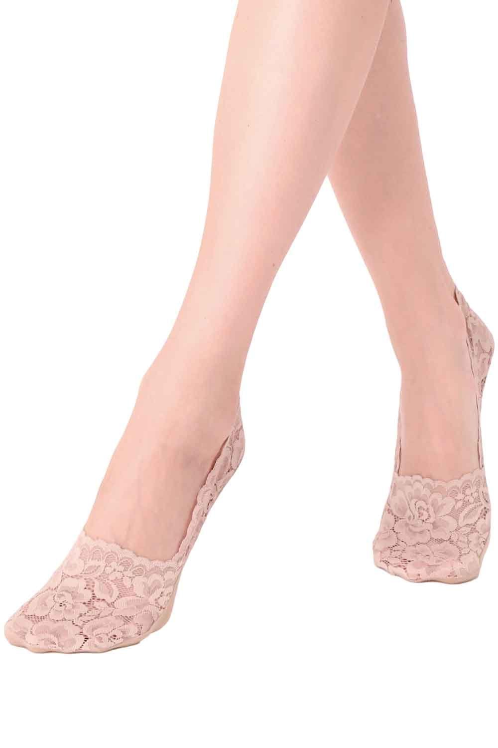 Cosmetic coloured lace socks worn by a person on a white background
