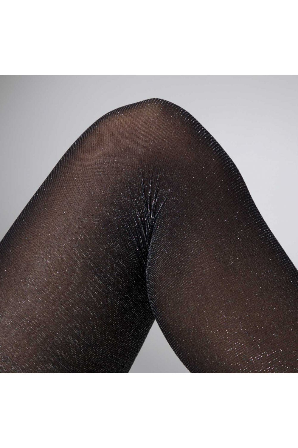 Silver sparkle tights on a grey/ white background