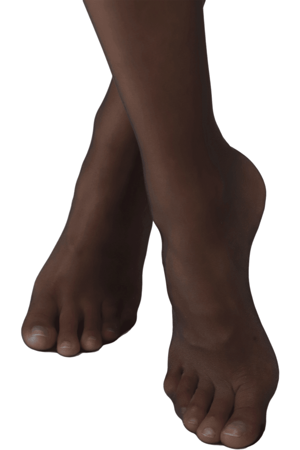 Close-up of a person's feet with black stockings on a white background