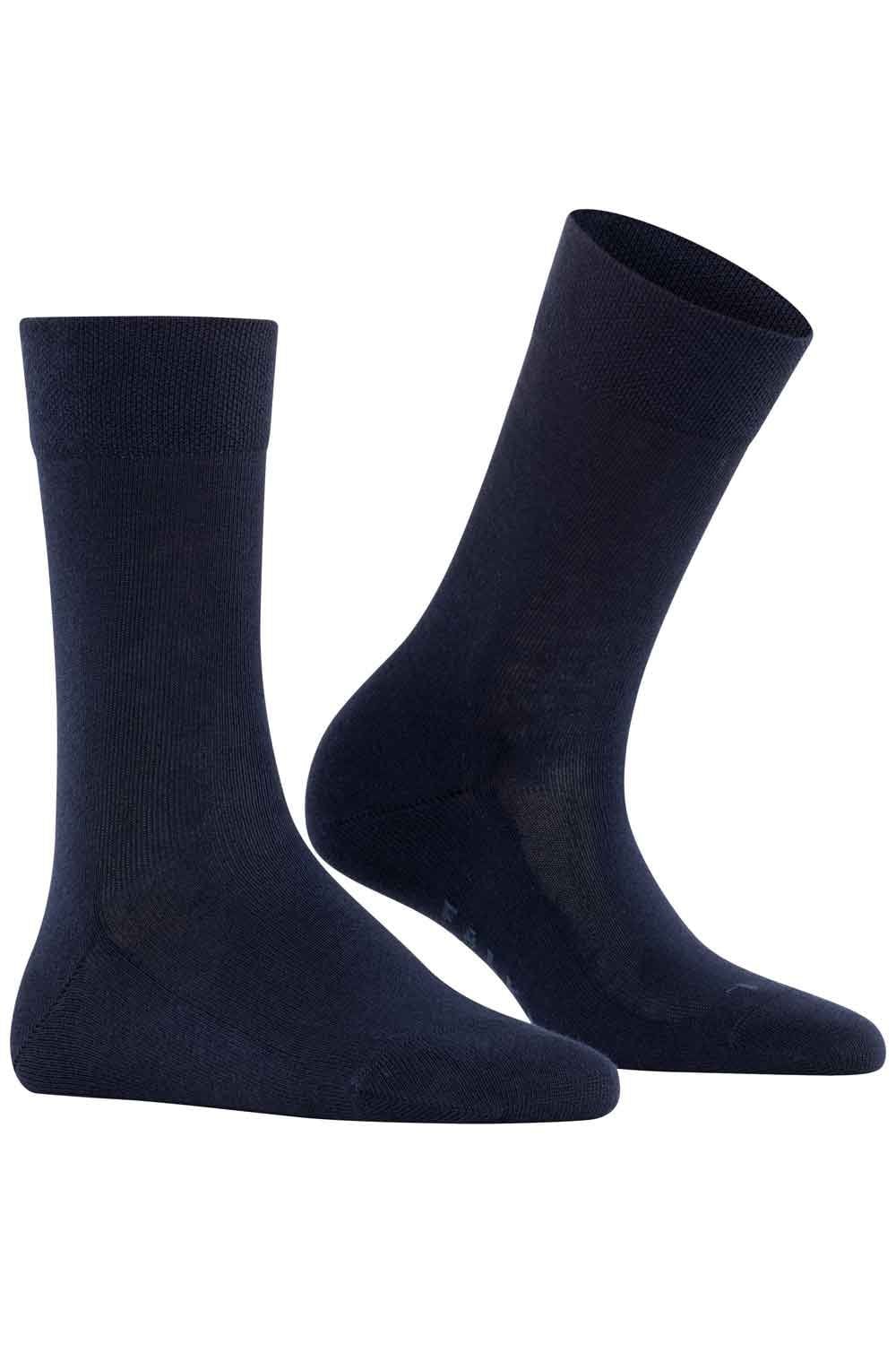 Two navy blue socks on a white background
