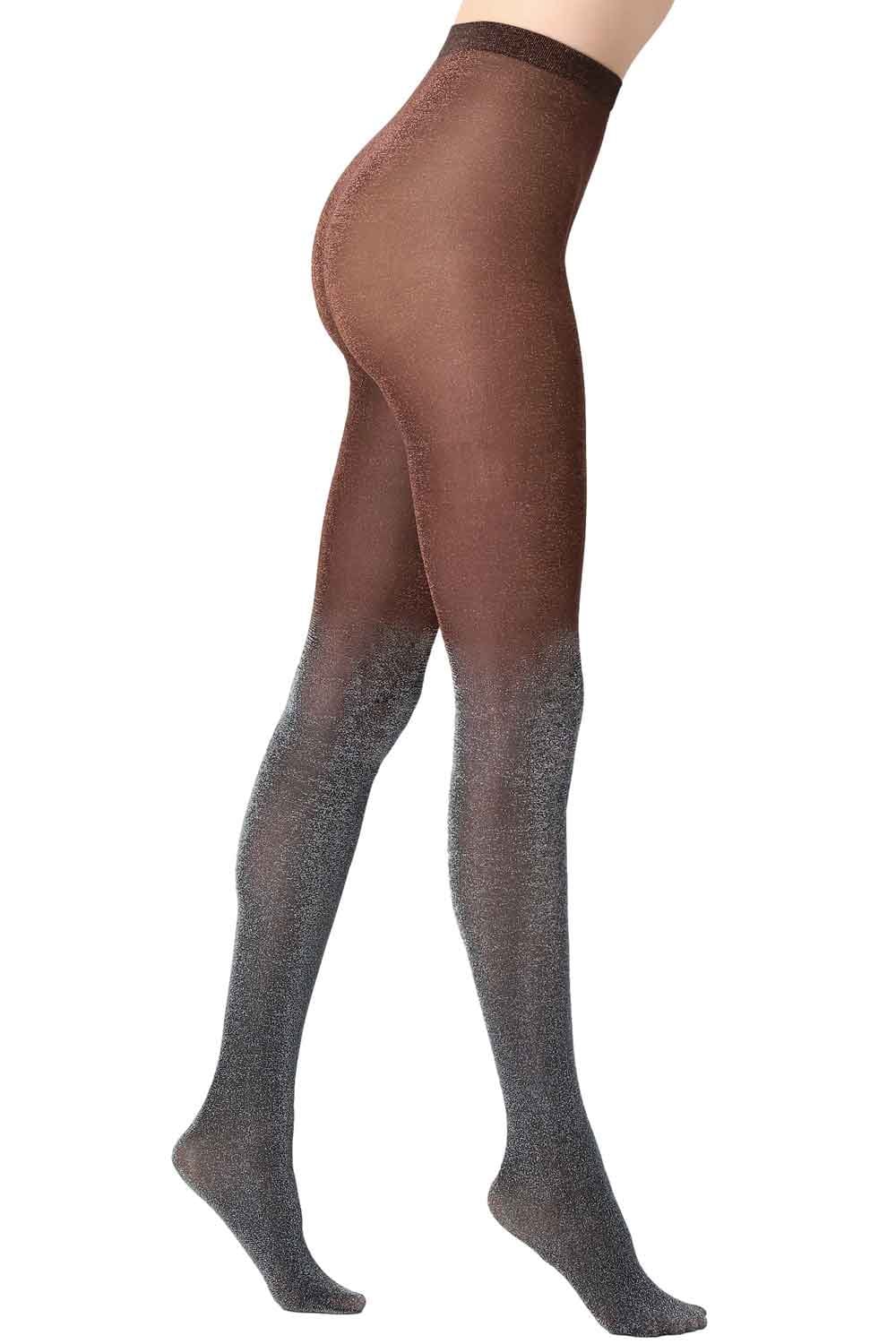 Silver bronze sparkly  tights worn by a person on a white background