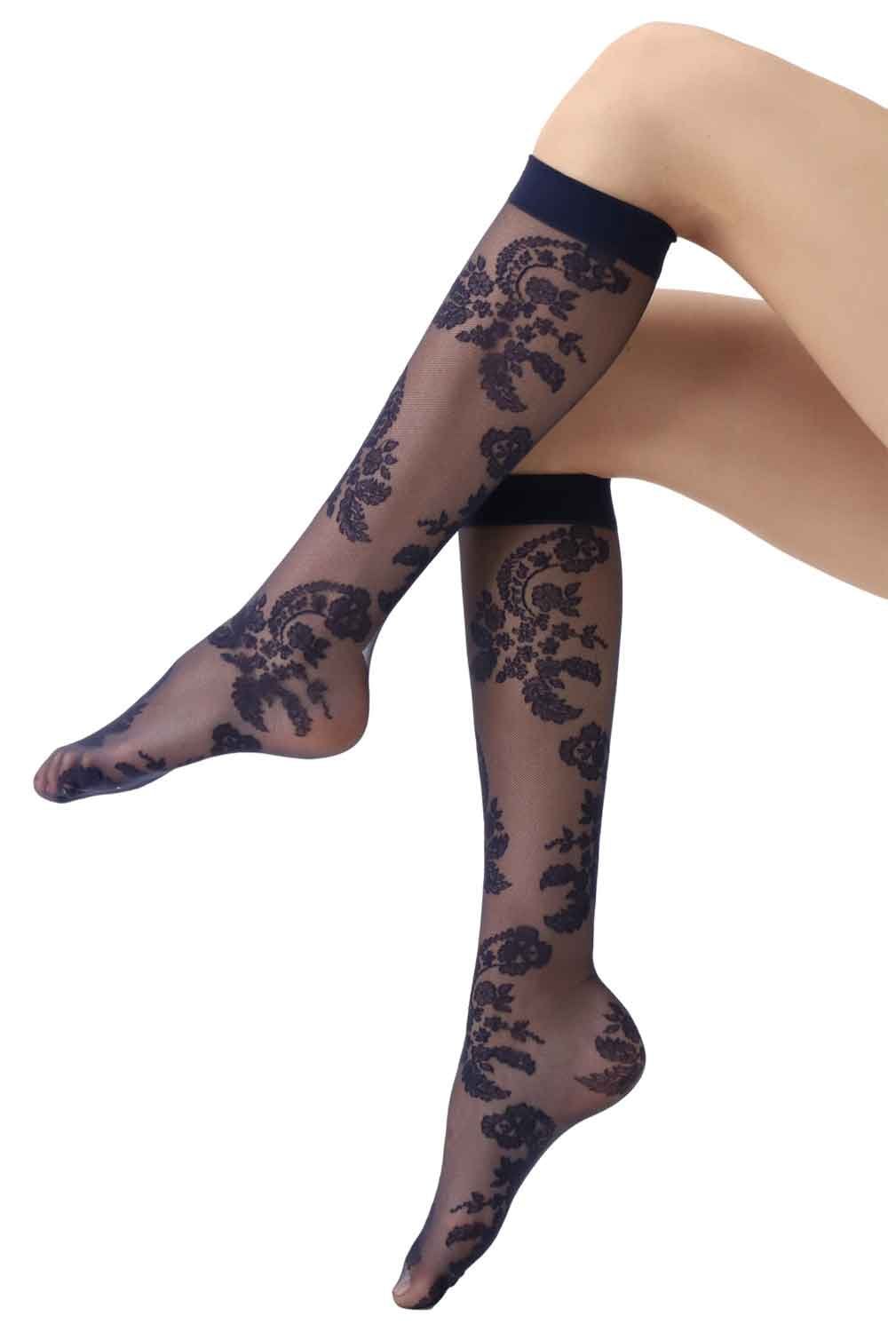 Black floral lace knee highs  worn by a person on a white background