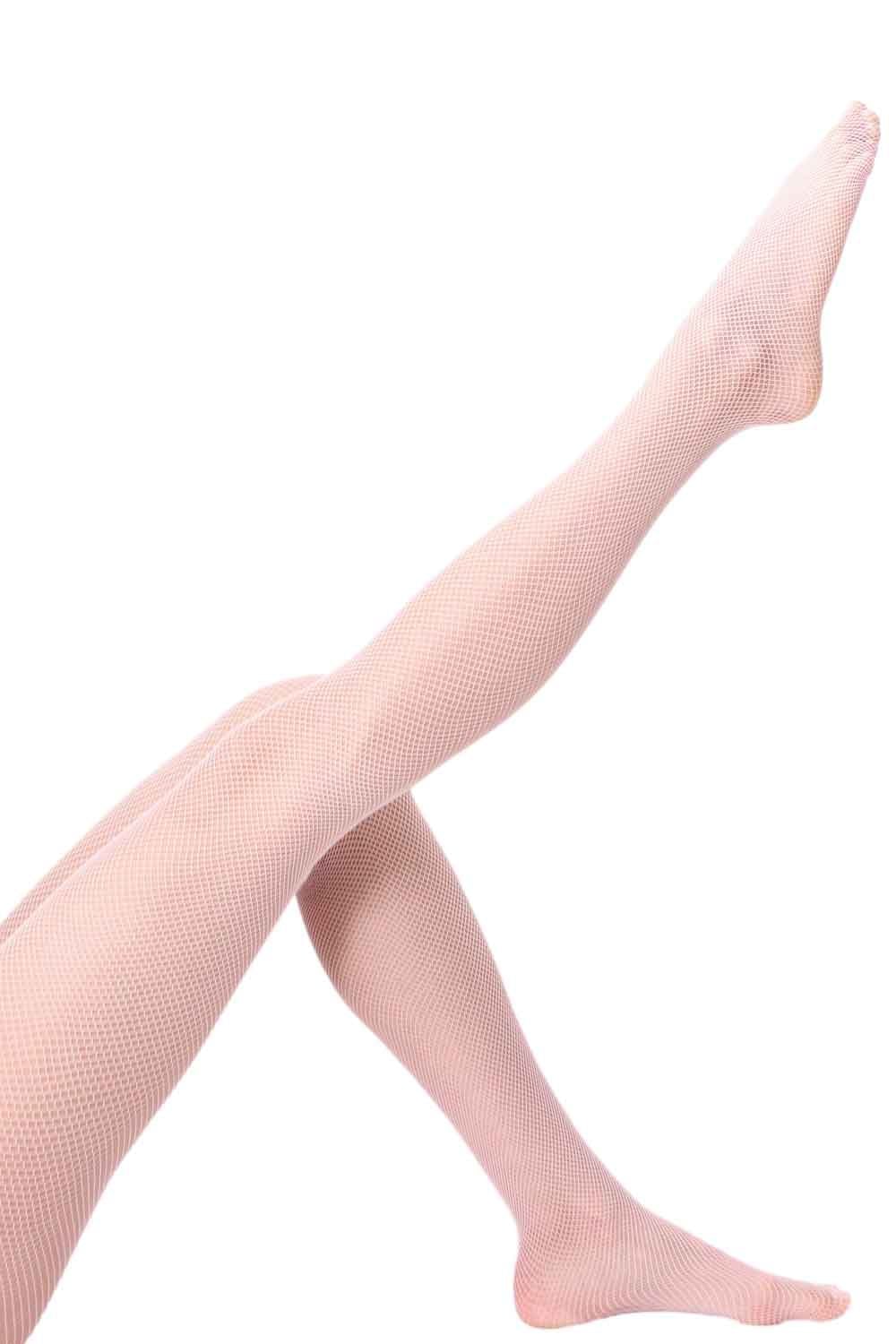 Rose coloured fishnet  tights worn by a person on a white background