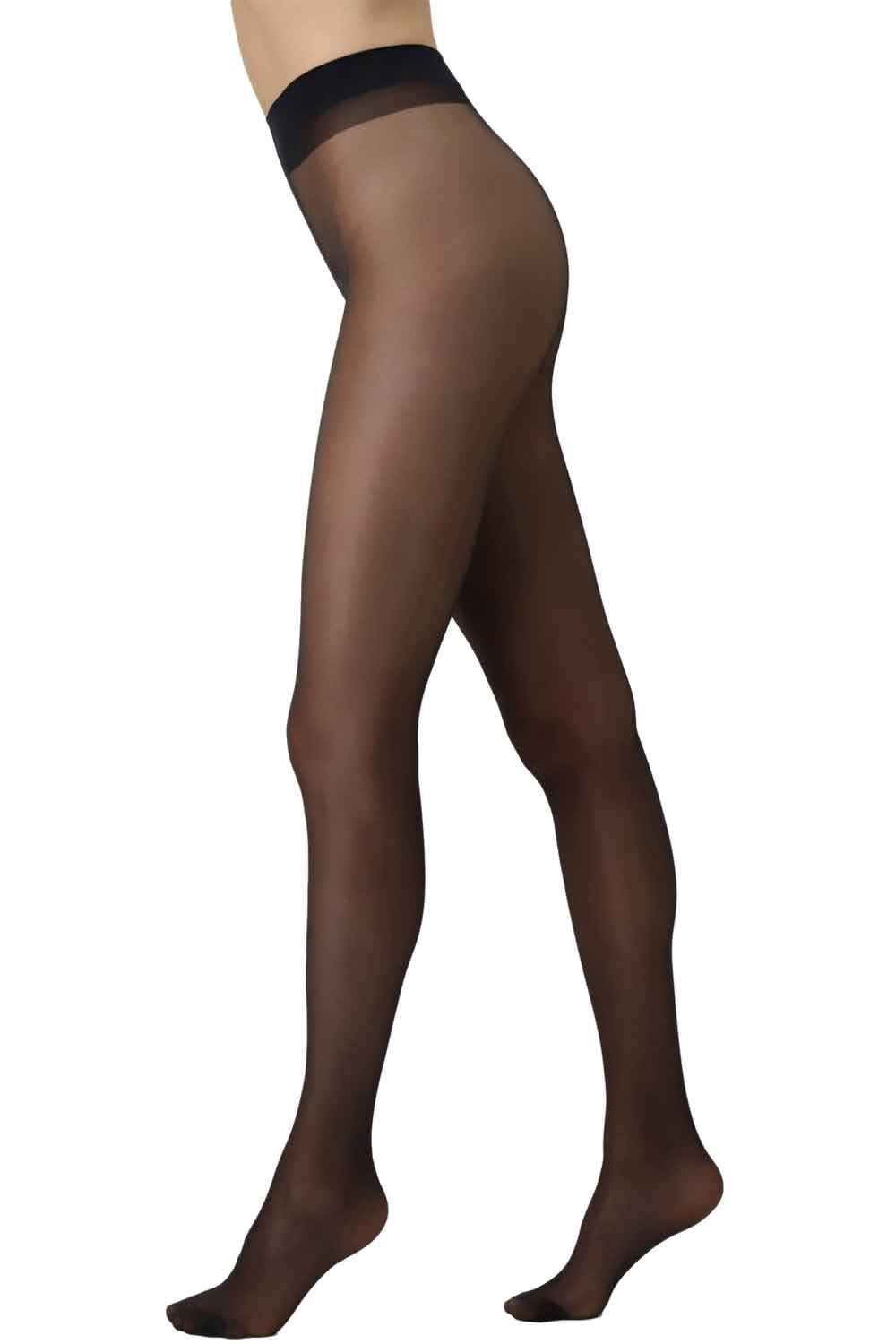 Black sheer tights worn by a model on a white background