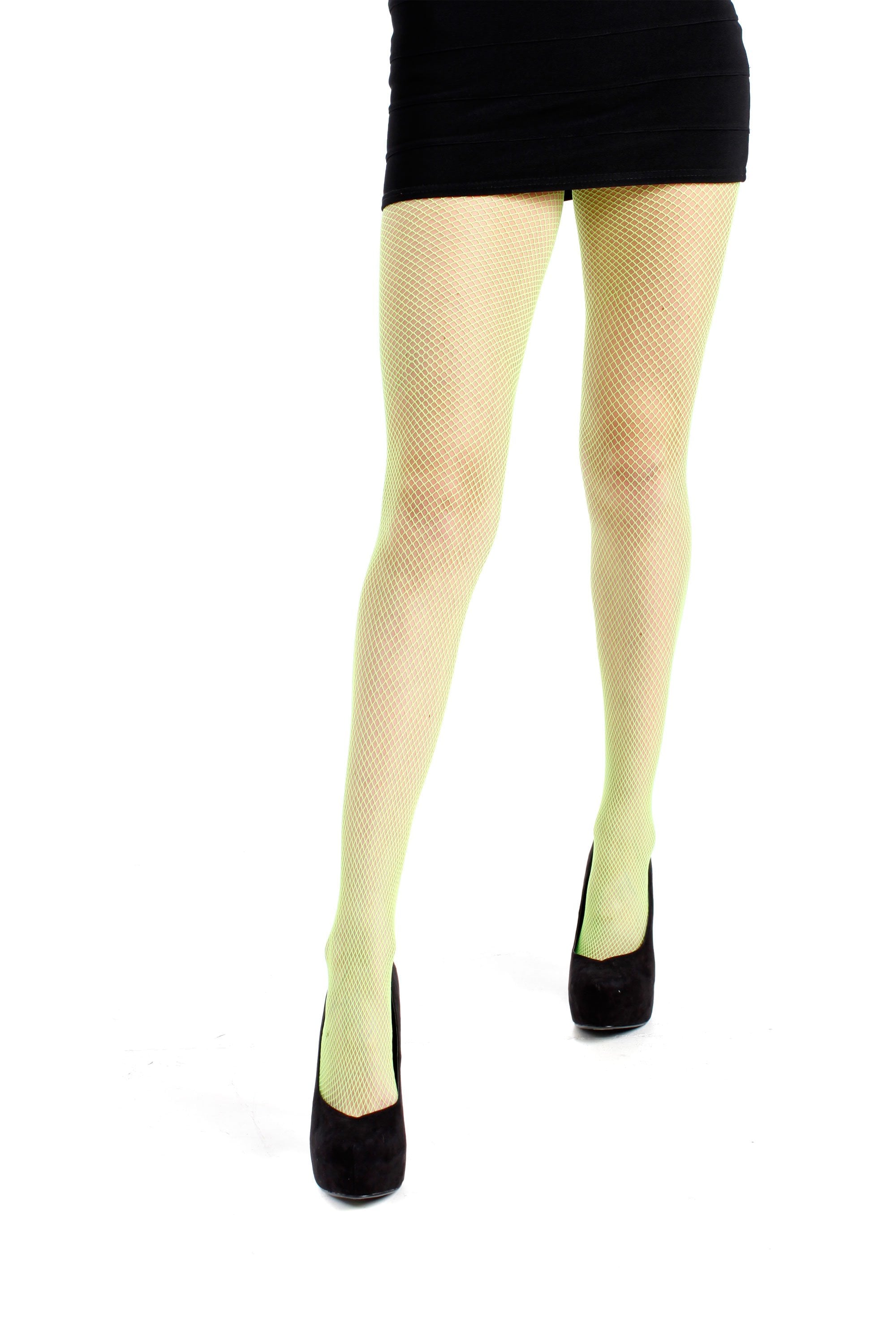 Flourescent green fishnet tights worn with black high heels on a white background
